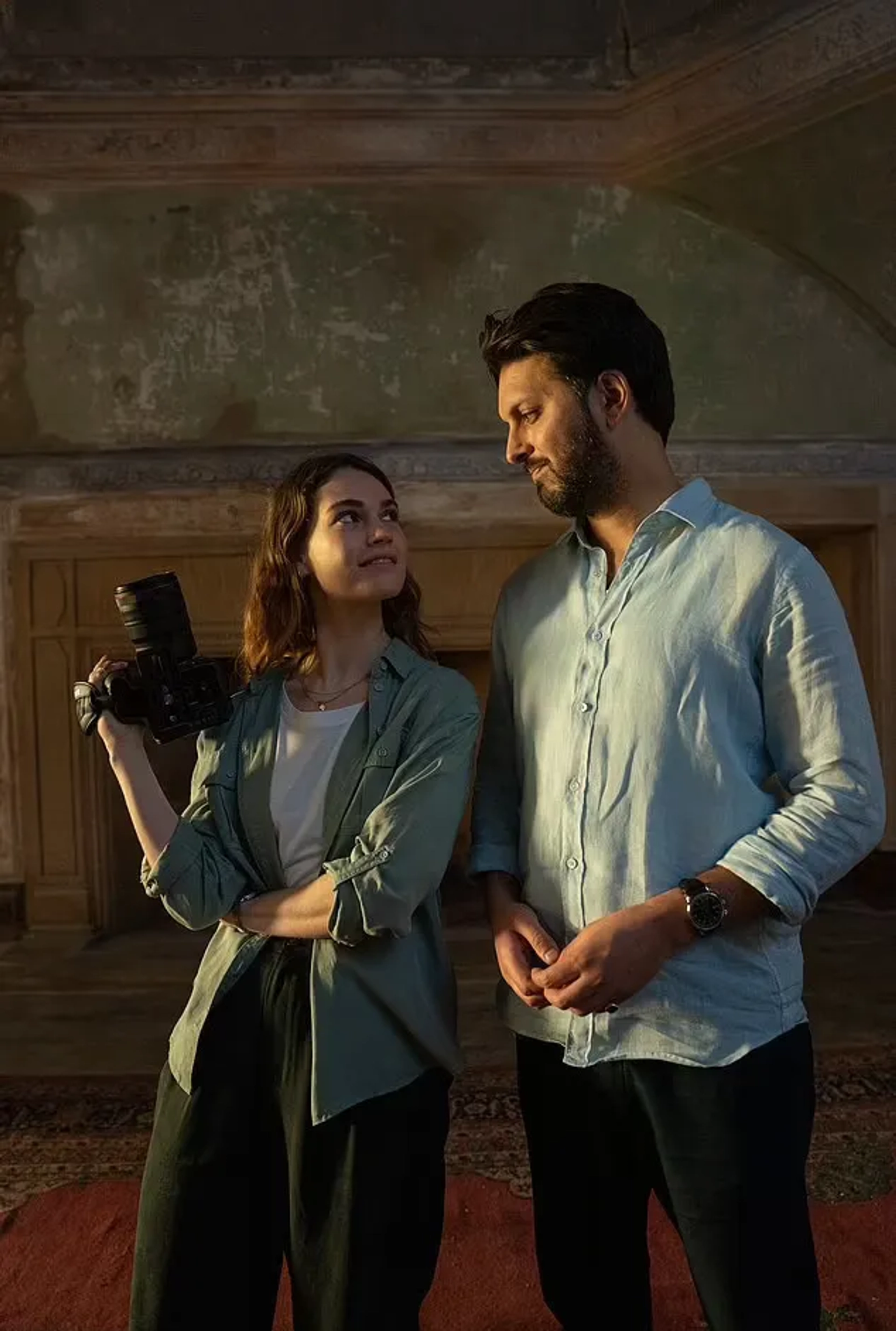 Shazad Latif and Lily James in What's Love Got to Do with It? (2022)