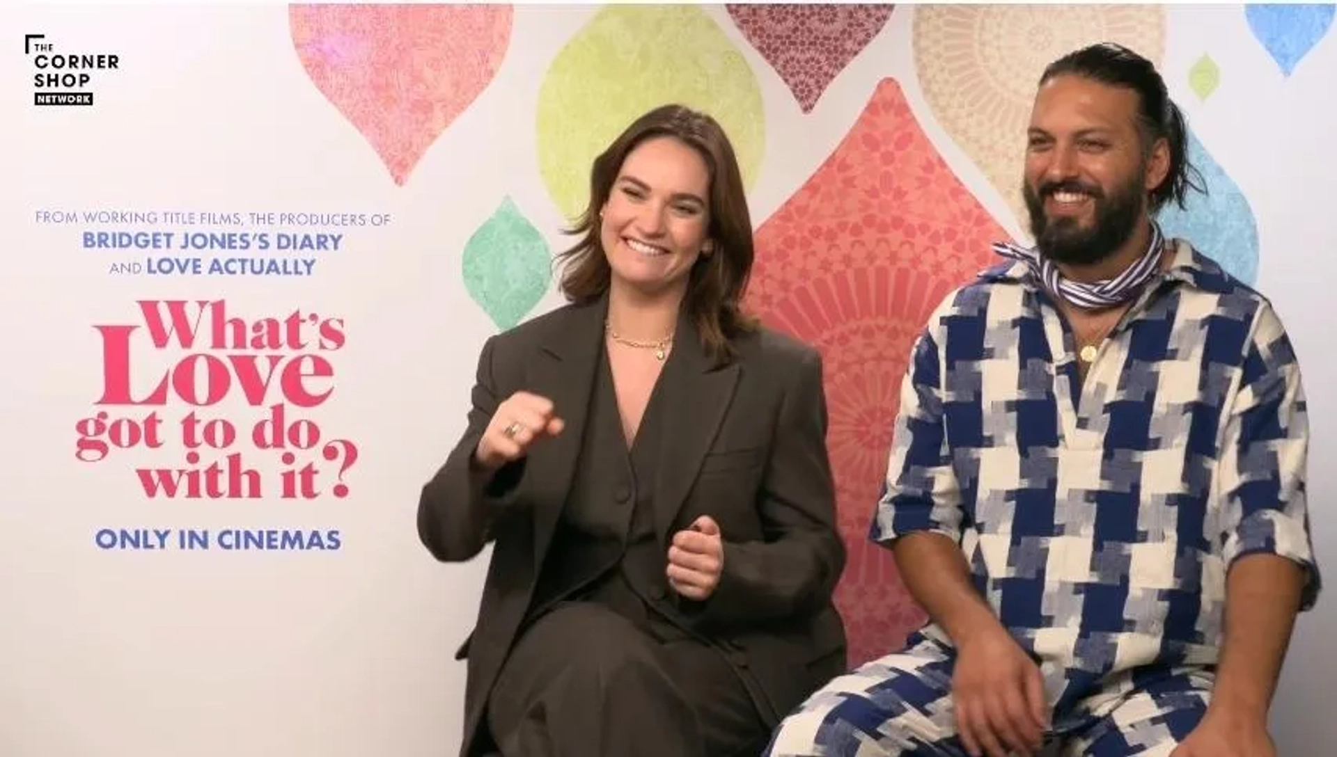 Shazad Latif and Lily James in What's Love Got to Do with It? (2022)
