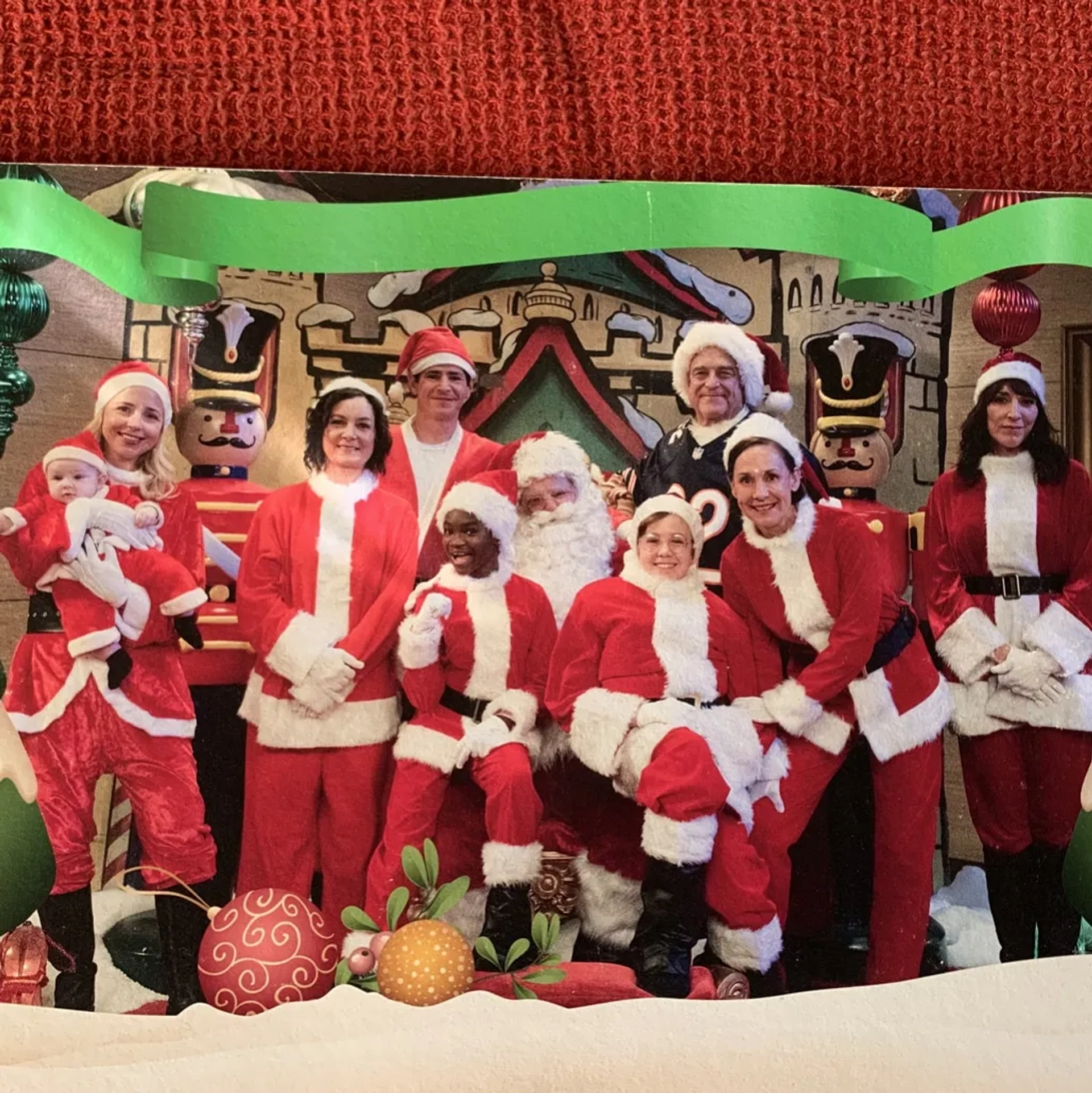 John Goodman, Sara Gilbert, Katey Sagal, Michael Fishman, Alicia Goranson, Laurie Metcalf, Emma Kenney, Jayden Rey, and Ames McNamara in The Conners: Smoking Penguins and Santa on Santa Action (2019)