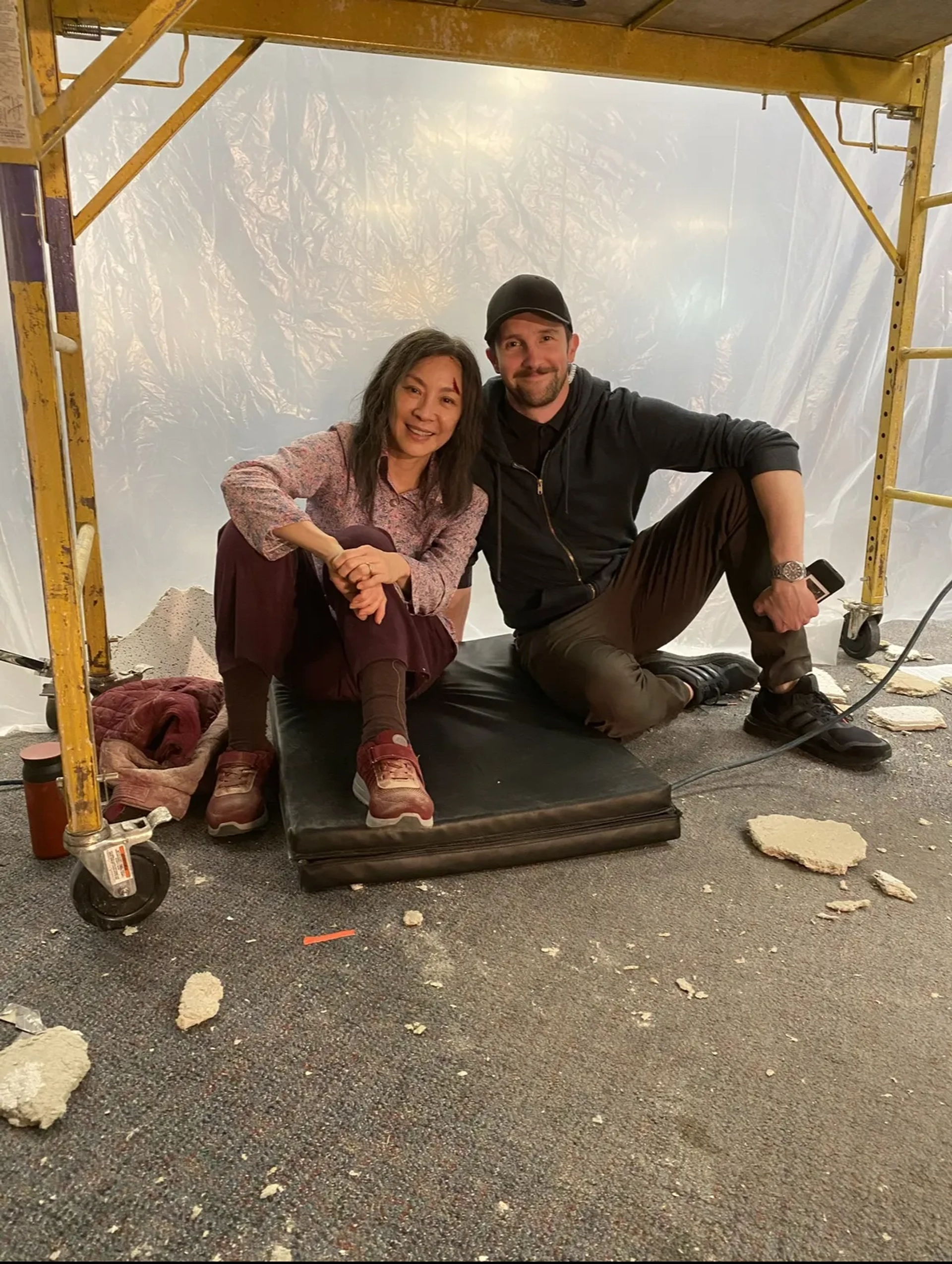 Michelle Yeoh and Timothy between shots on Everything Everywhere All At Once