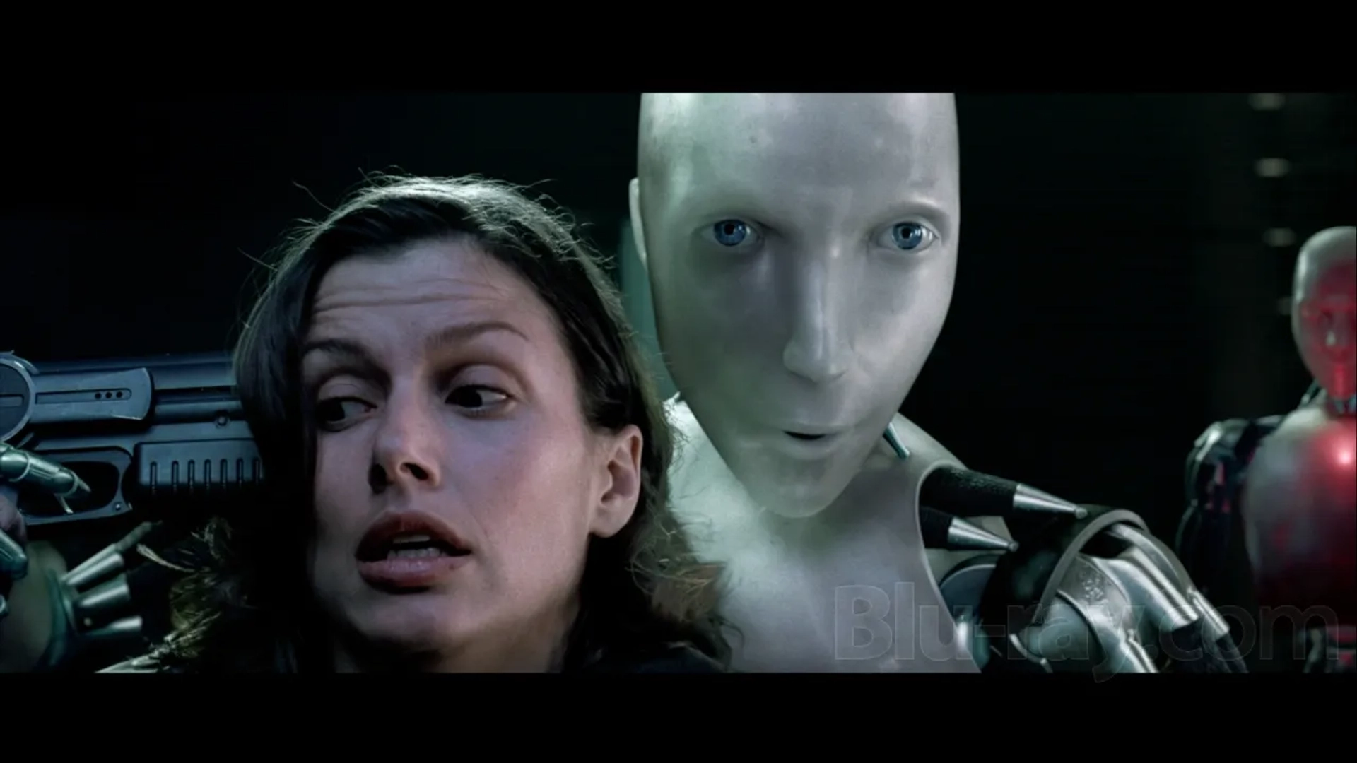 Bridget Moynahan and Alan Tudyk in I, Robot (2004)