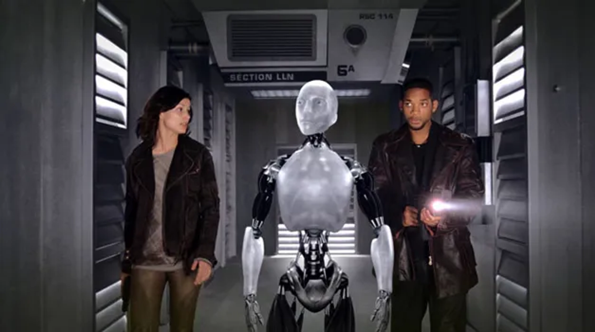 Will Smith, Bridget Moynahan, and Alan Tudyk in I, Robot (2004)