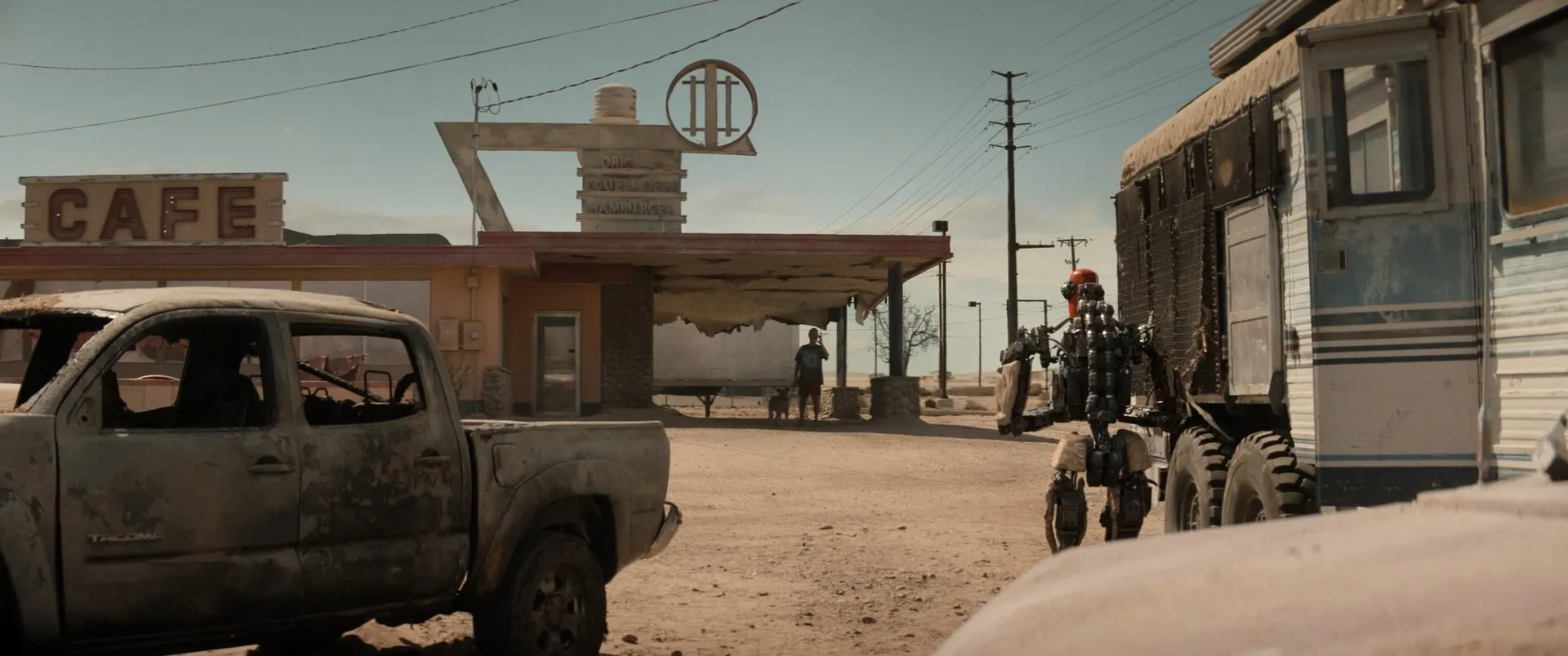 Tom Hanks, Seamus, and Caleb Landry Jones in Finch (2021)