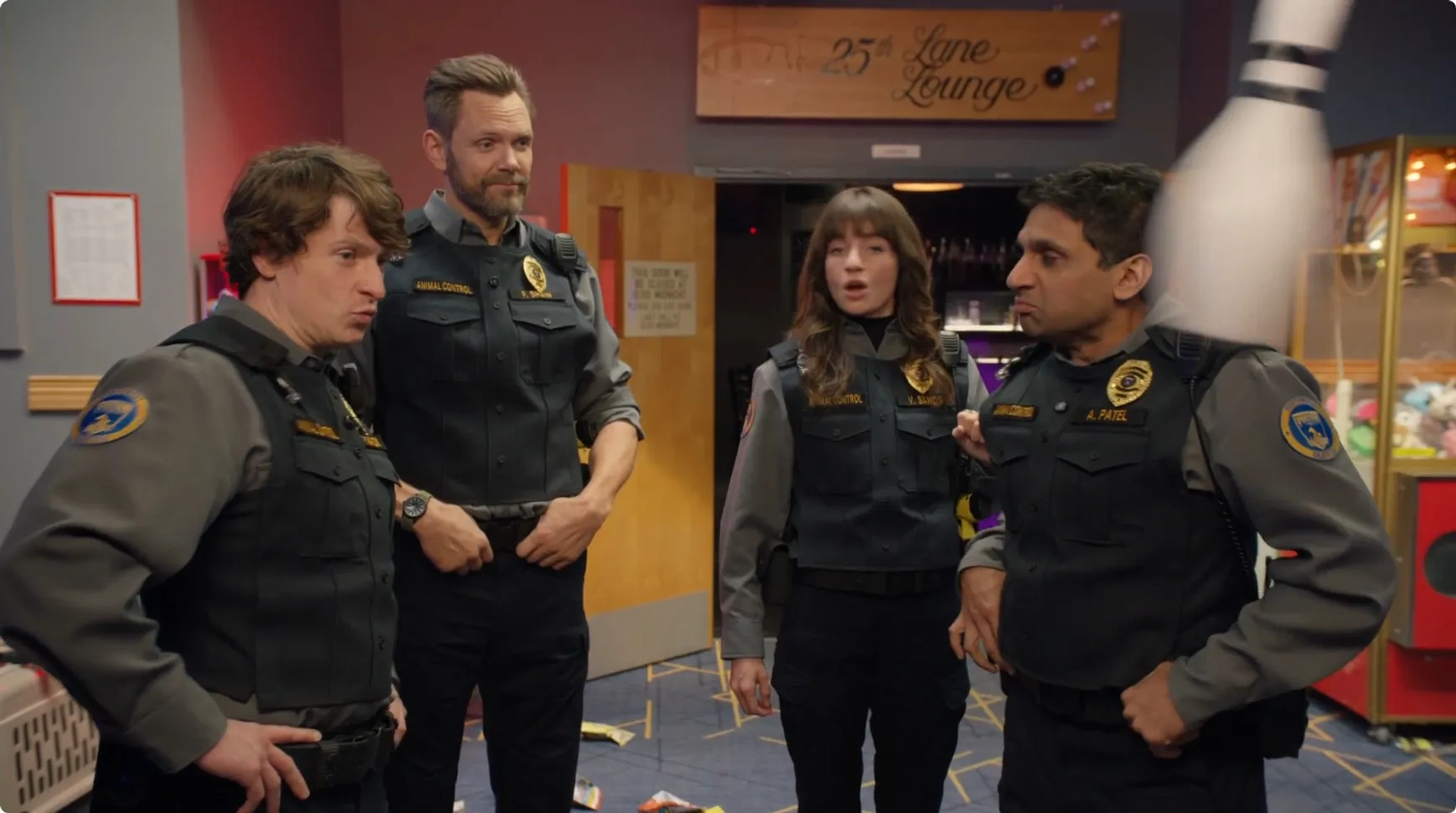 Joel McHale, Ravi Patel, Grace Palmer, and Michael Rowland in Animal Control (2023)