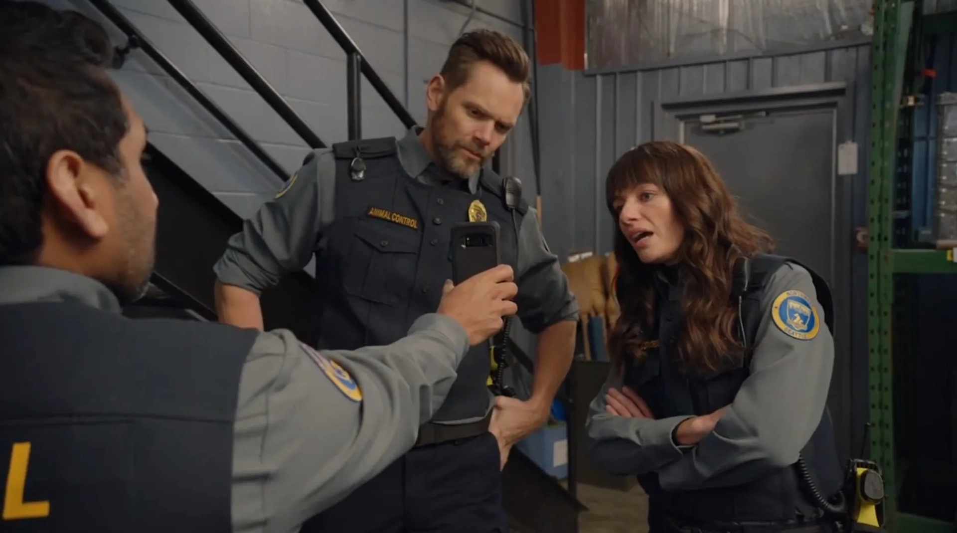 Joel McHale, Ravi Patel, and Grace Palmer in Animal Control (2023)