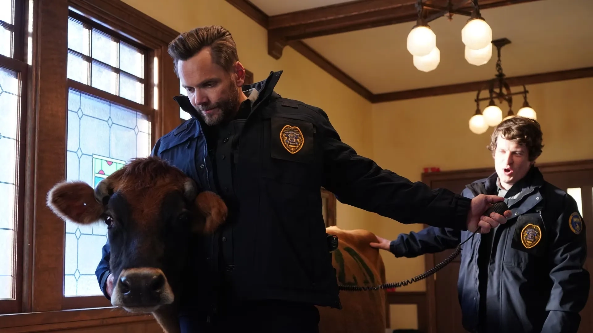 Joel McHale and Michael Rowland in Animal Control (2023)