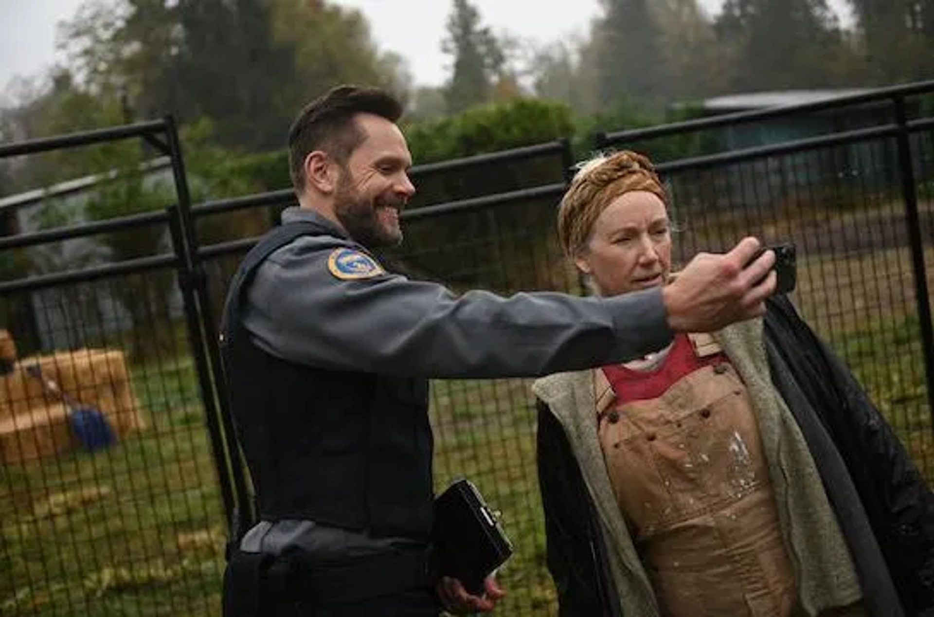 Joel McHale and Amanda Burke in Animal Control (2023)