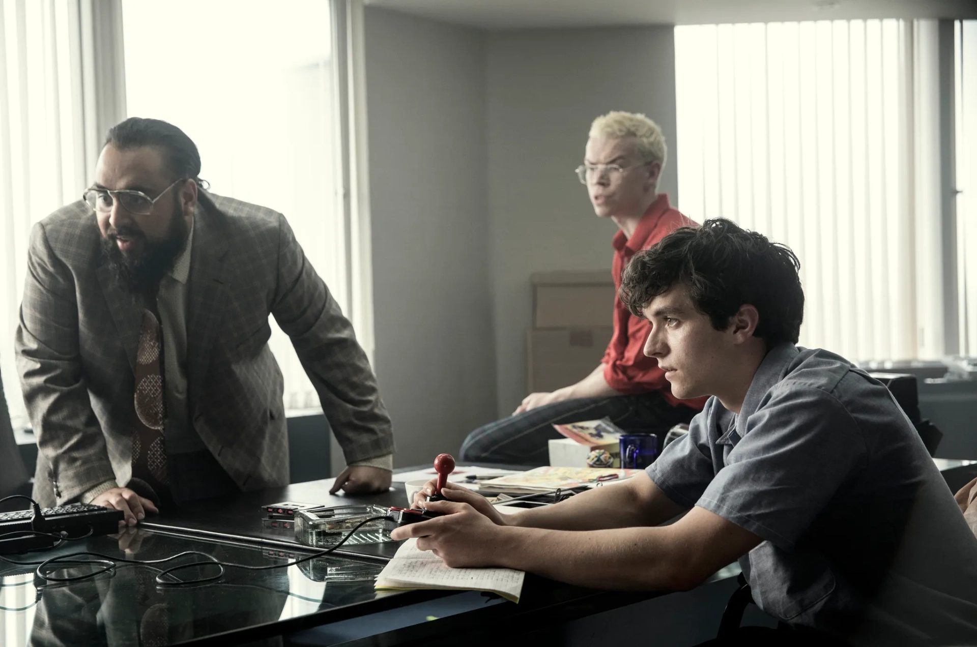 Will Poulter, Asim Chaudhry, and Fionn Whitehead in Black Mirror: Bandersnatch (2018)