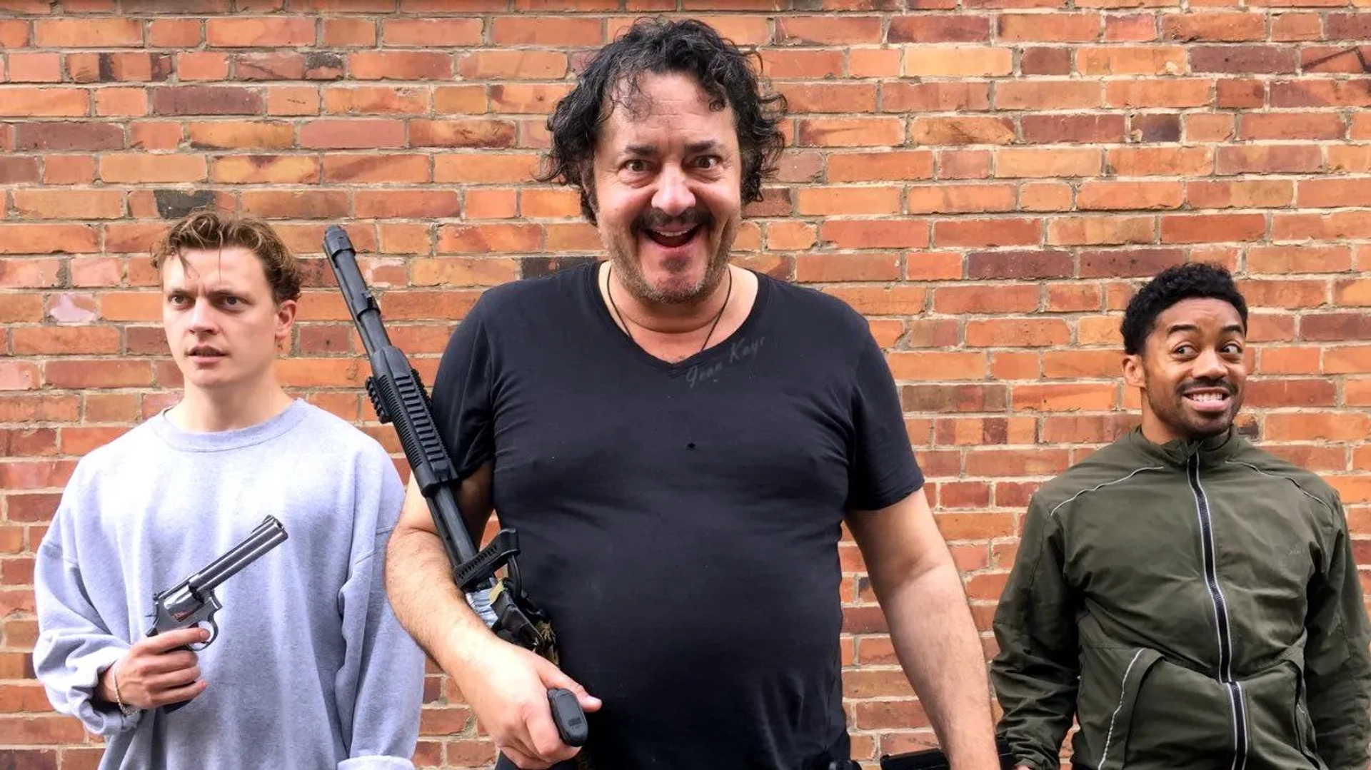 Ivan Kaye, David Burnell IV, and Jack Bandeira in Gunpowder Milkshake (2021)