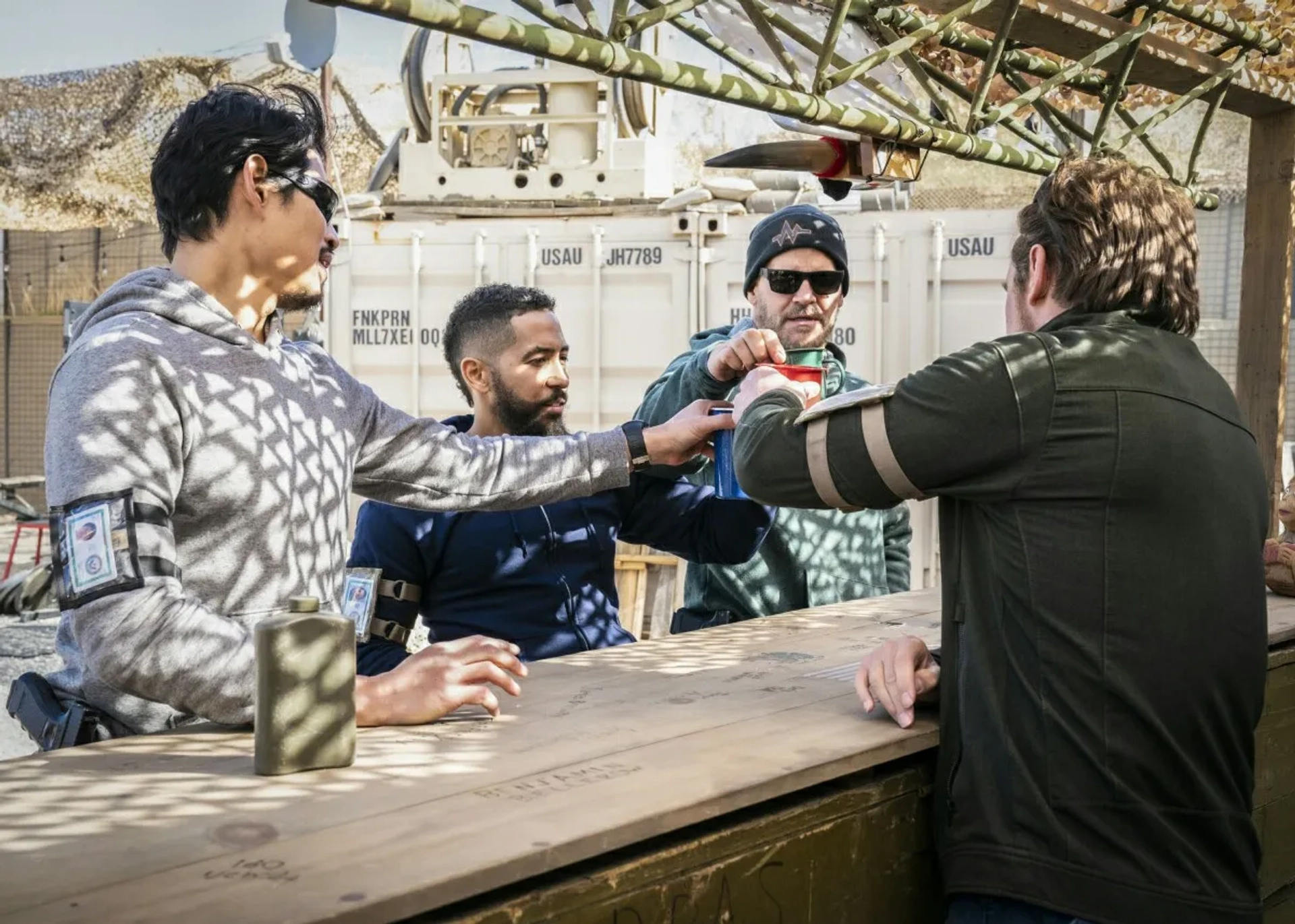 David Boreanaz, Neil Brown Jr., Tyler Grey, and Tim Chiou in SEAL Team: Edge of Nowhere (2020)