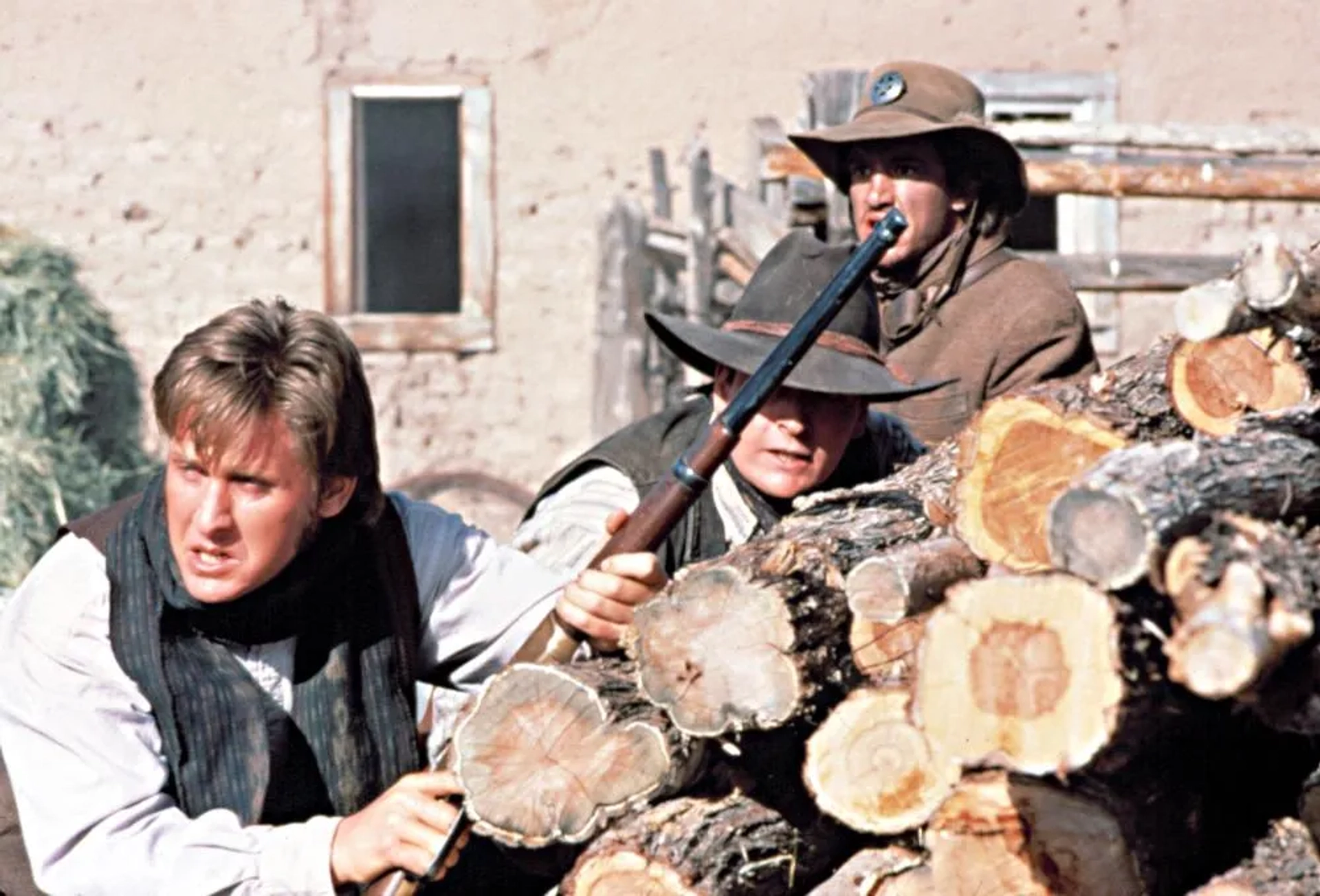 Charlie Sheen, Emilio Estevez, and Dermot Mulroney in Young Guns (1988)