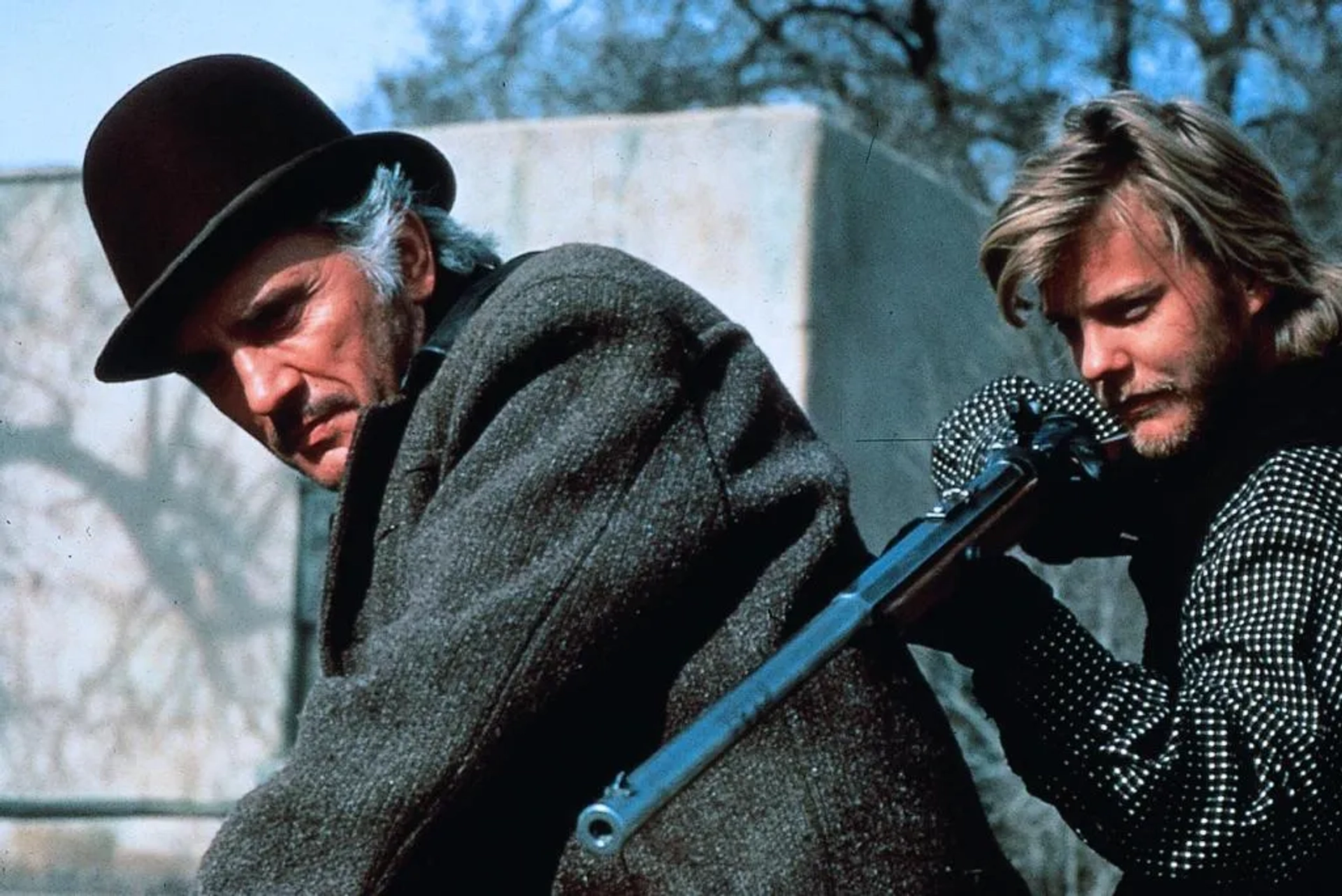 Terence Stamp and Kiefer Sutherland in Young Guns (1988)