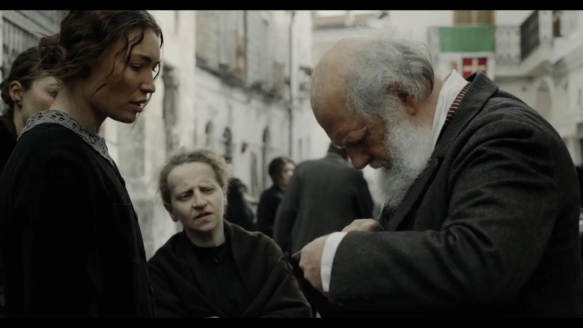 Ermanno De Biagi, Marilia La Torre, and Cristina Chiriac in Padre Pio (2022)