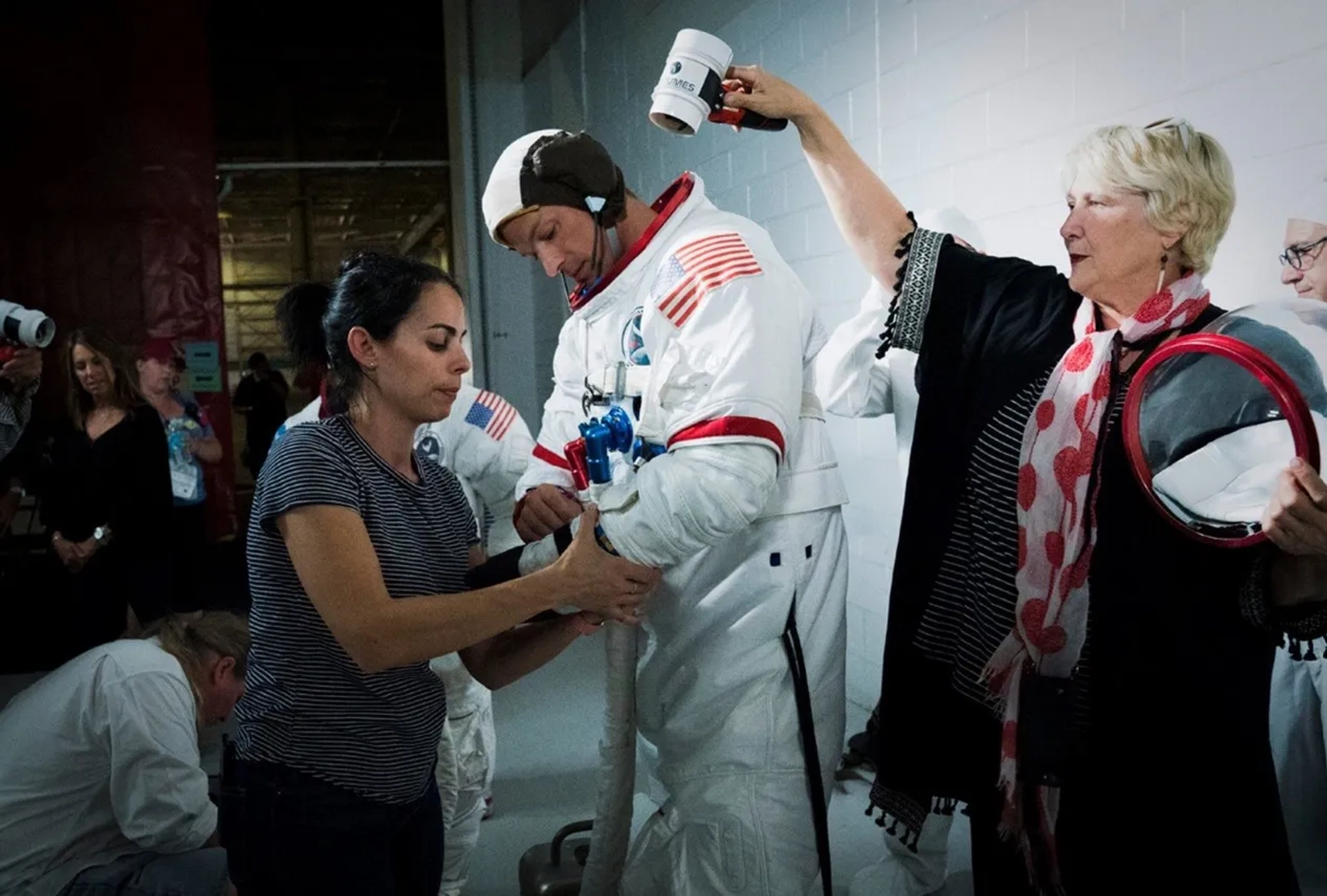 Jackie Martinez and Jill Ohanneson with Joel Kinnaman in For All Mankind