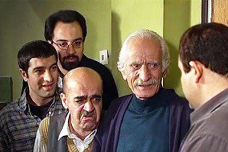 Kiumars Malekmotei, Majid Salehi, Borzou Arjmand, Hamid Lolayi, and Mehran Ghafoorian in Under the City Sky (2001)
