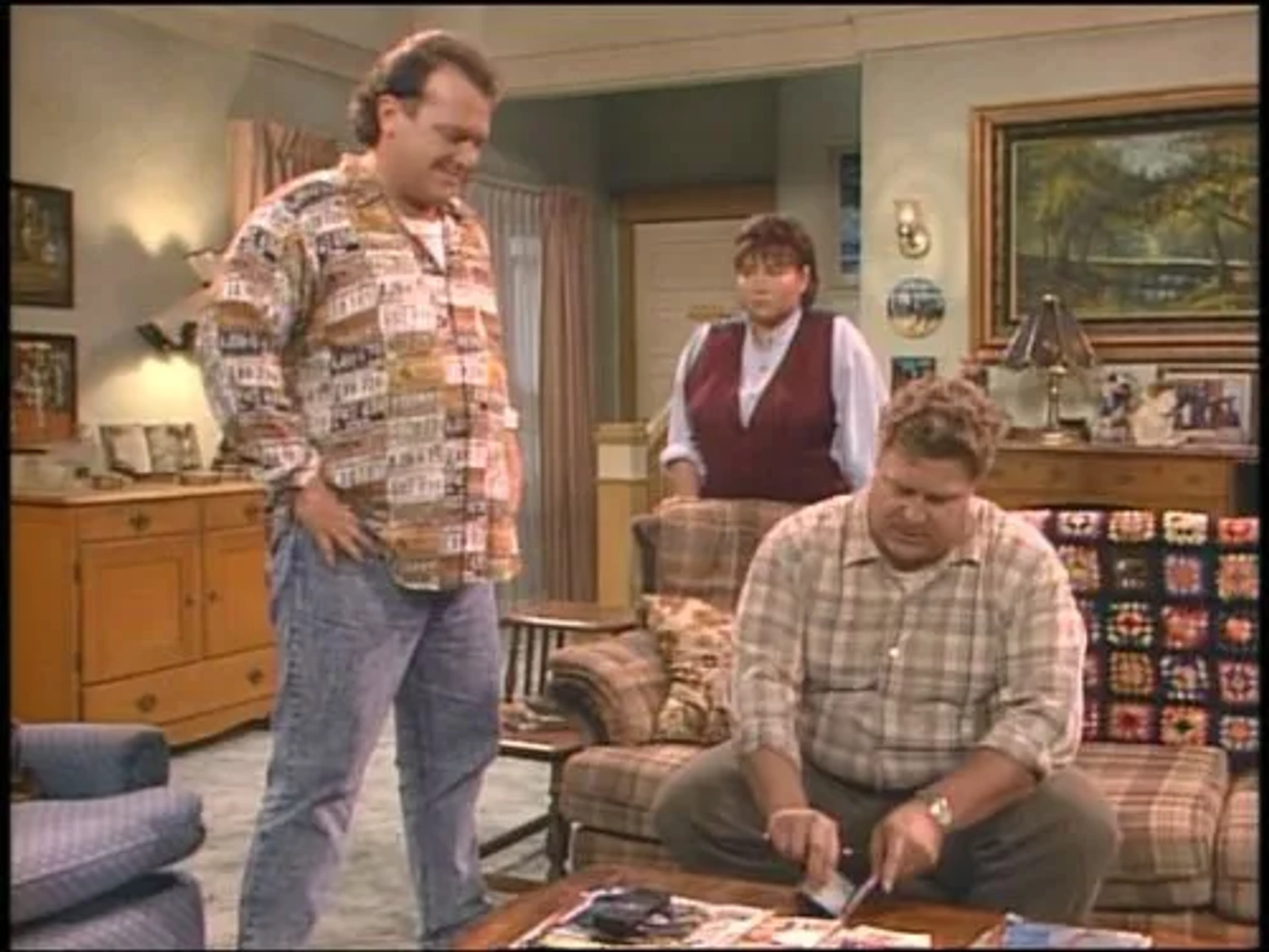 John Goodman, Tom Arnold, and Roseanne Barr in Roseanne (1988)