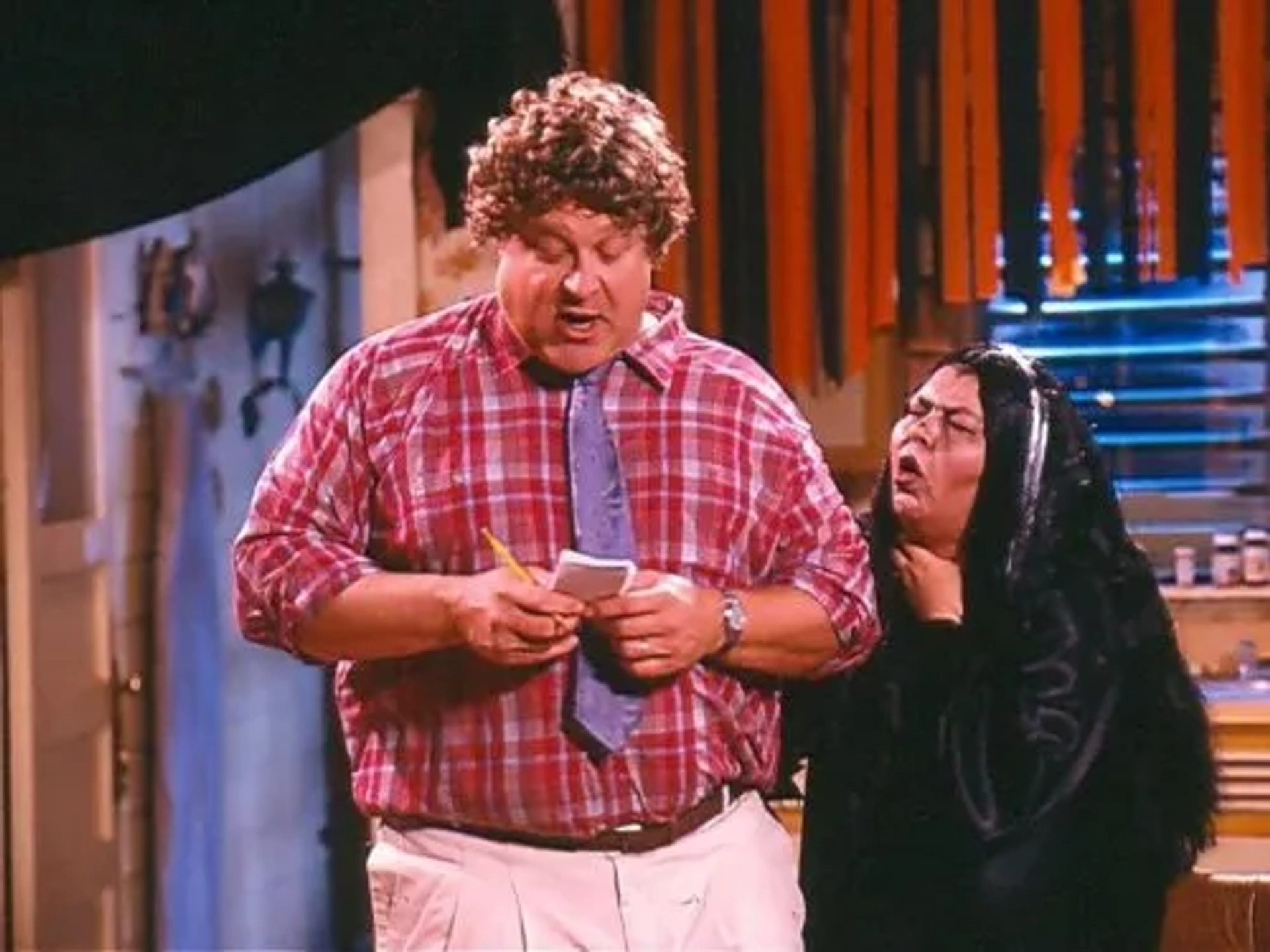 John Goodman and Roseanne Barr in Roseanne (1988)