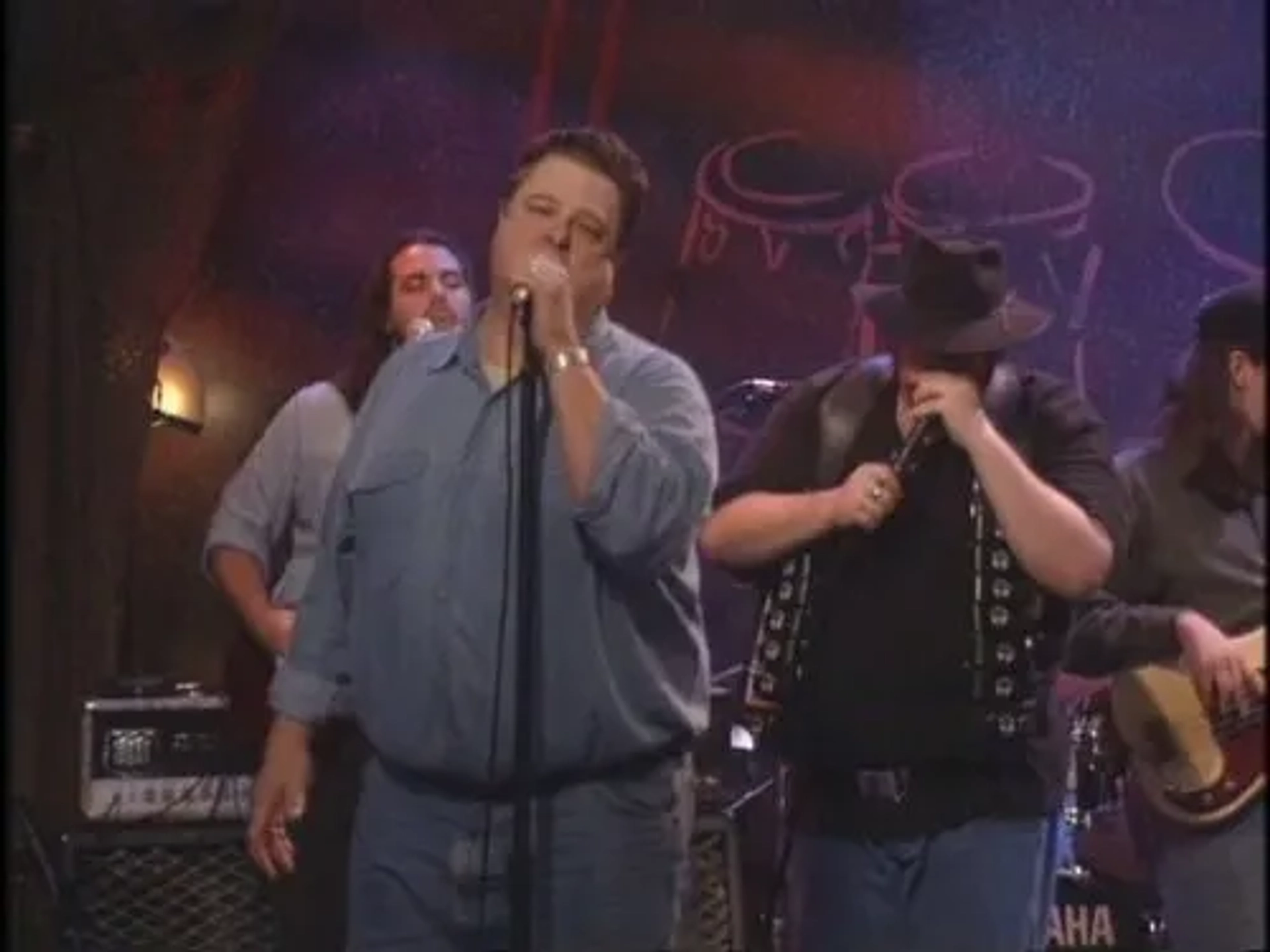 John Goodman and John Popper in Roseanne (1988)