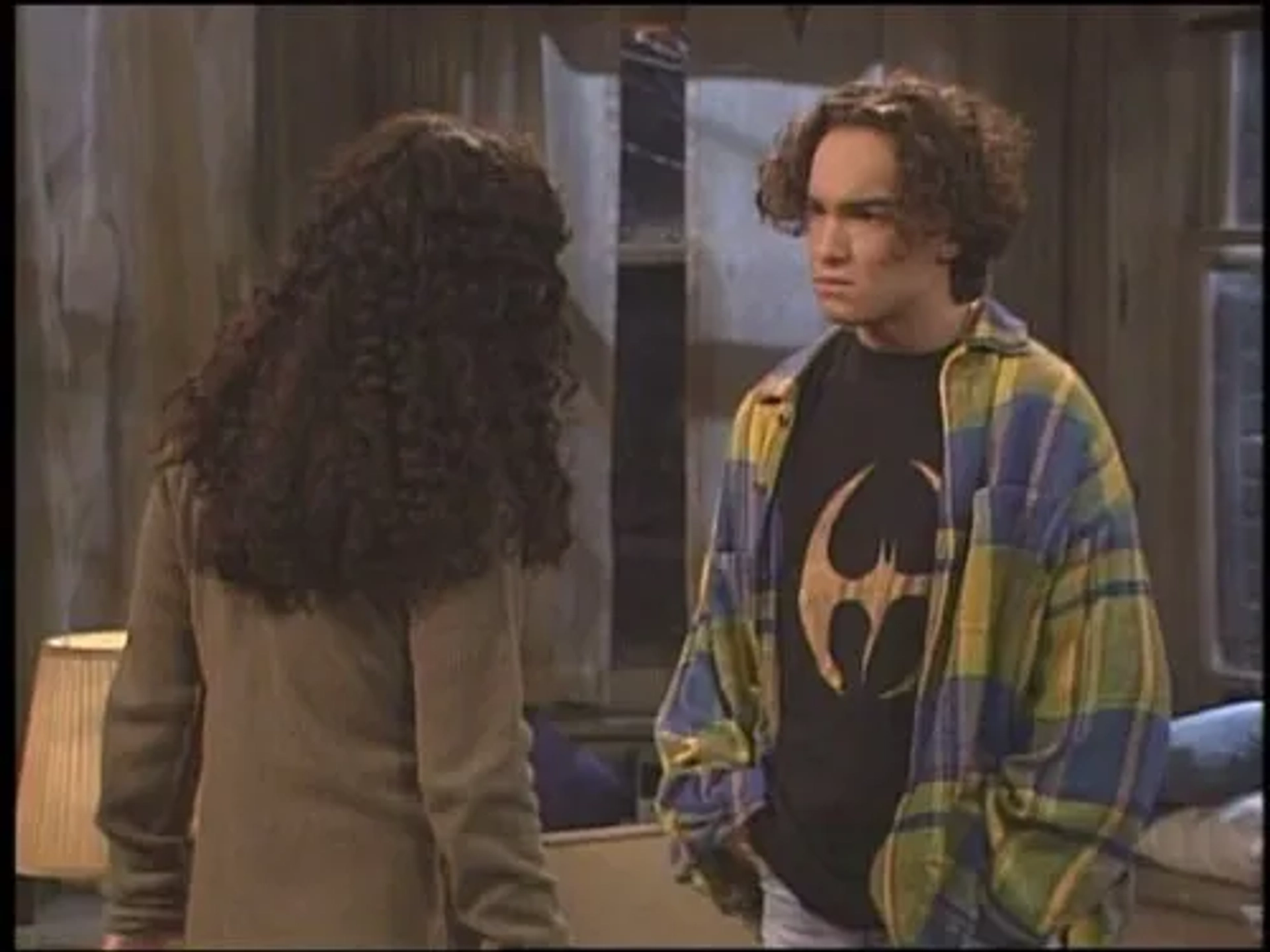 Sara Gilbert and Johnny Galecki in Roseanne (1988)