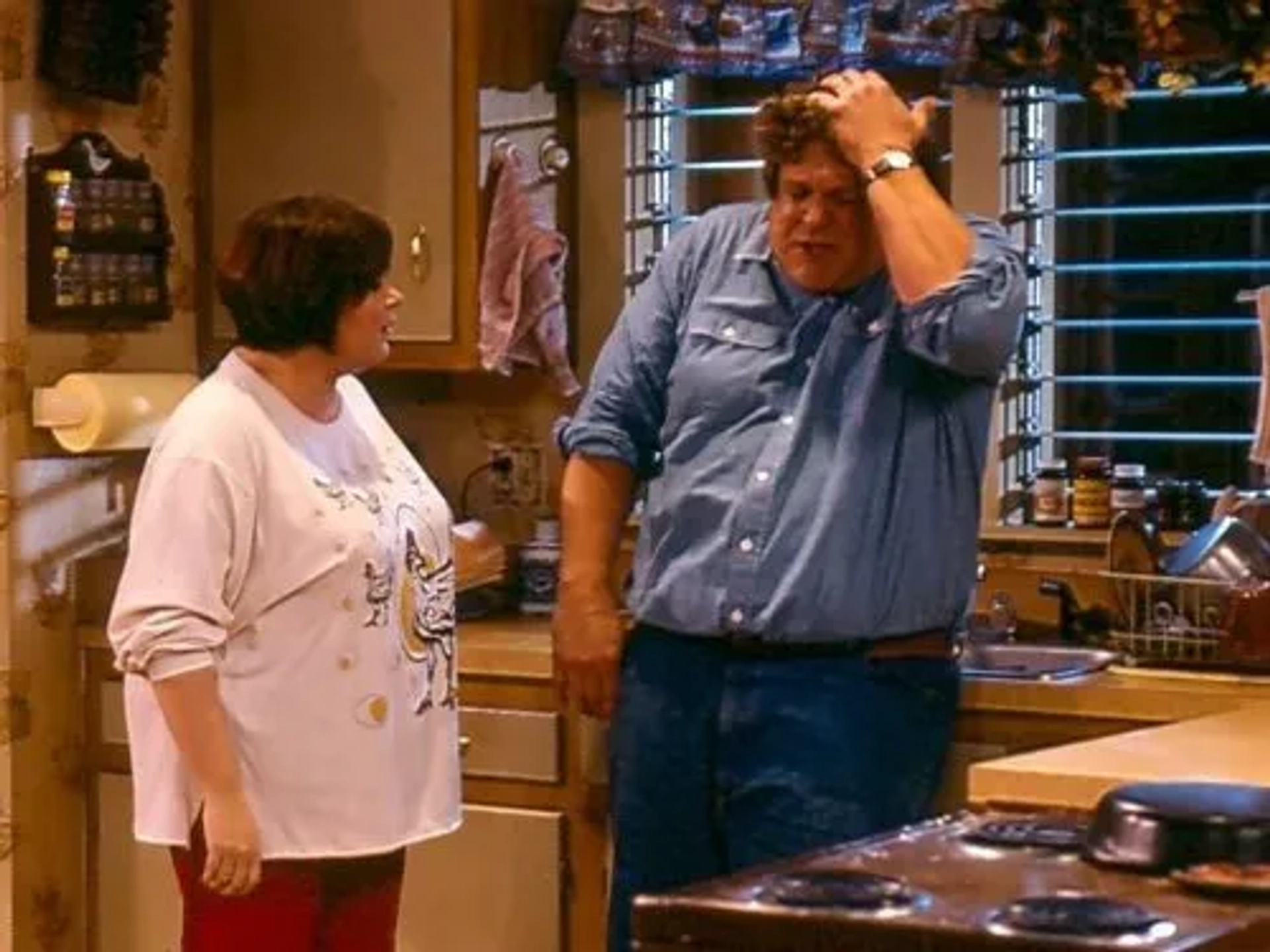 John Goodman and Roseanne Barr in Roseanne (1988)