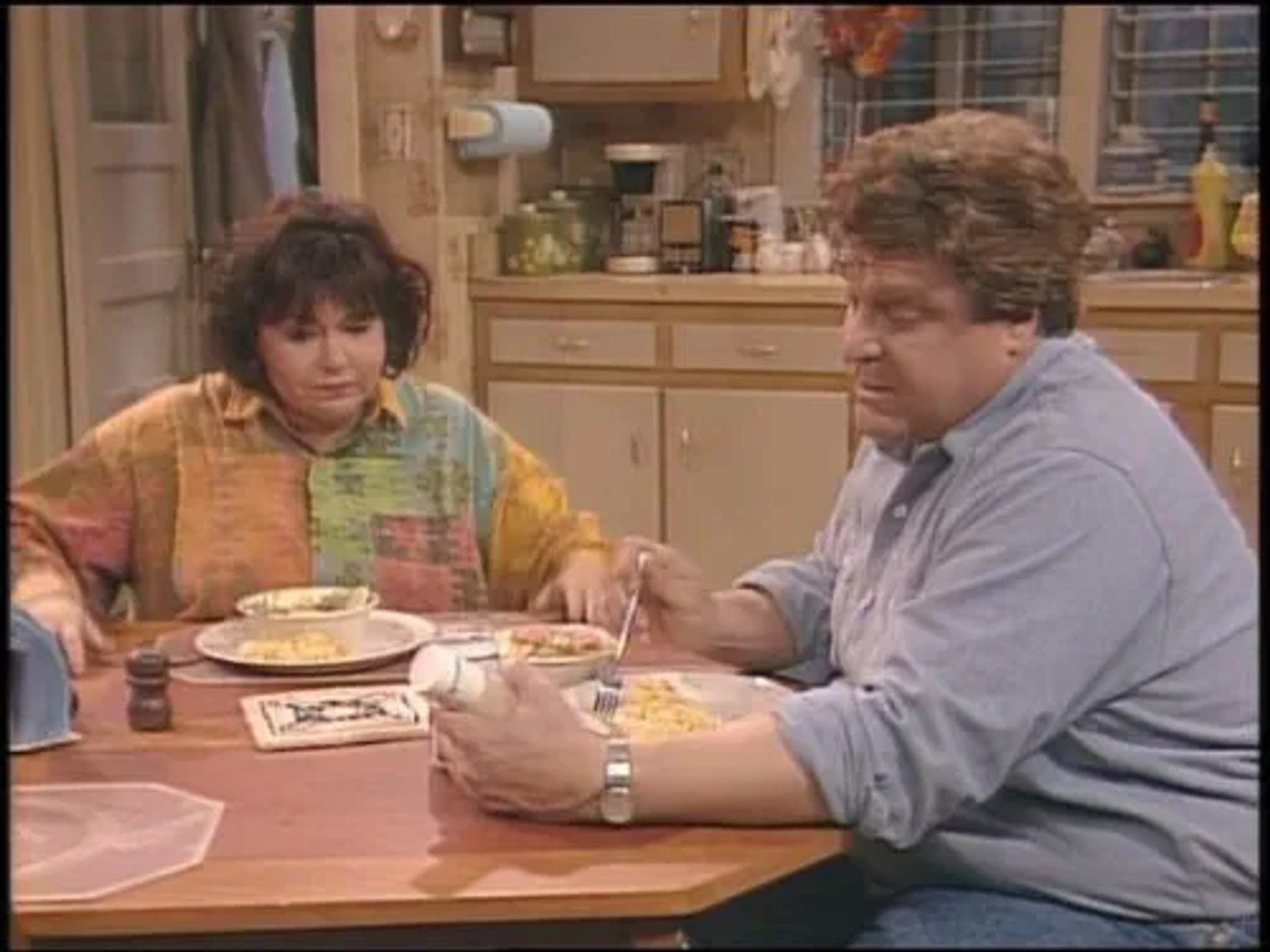 John Goodman and Roseanne Barr in Roseanne (1988)