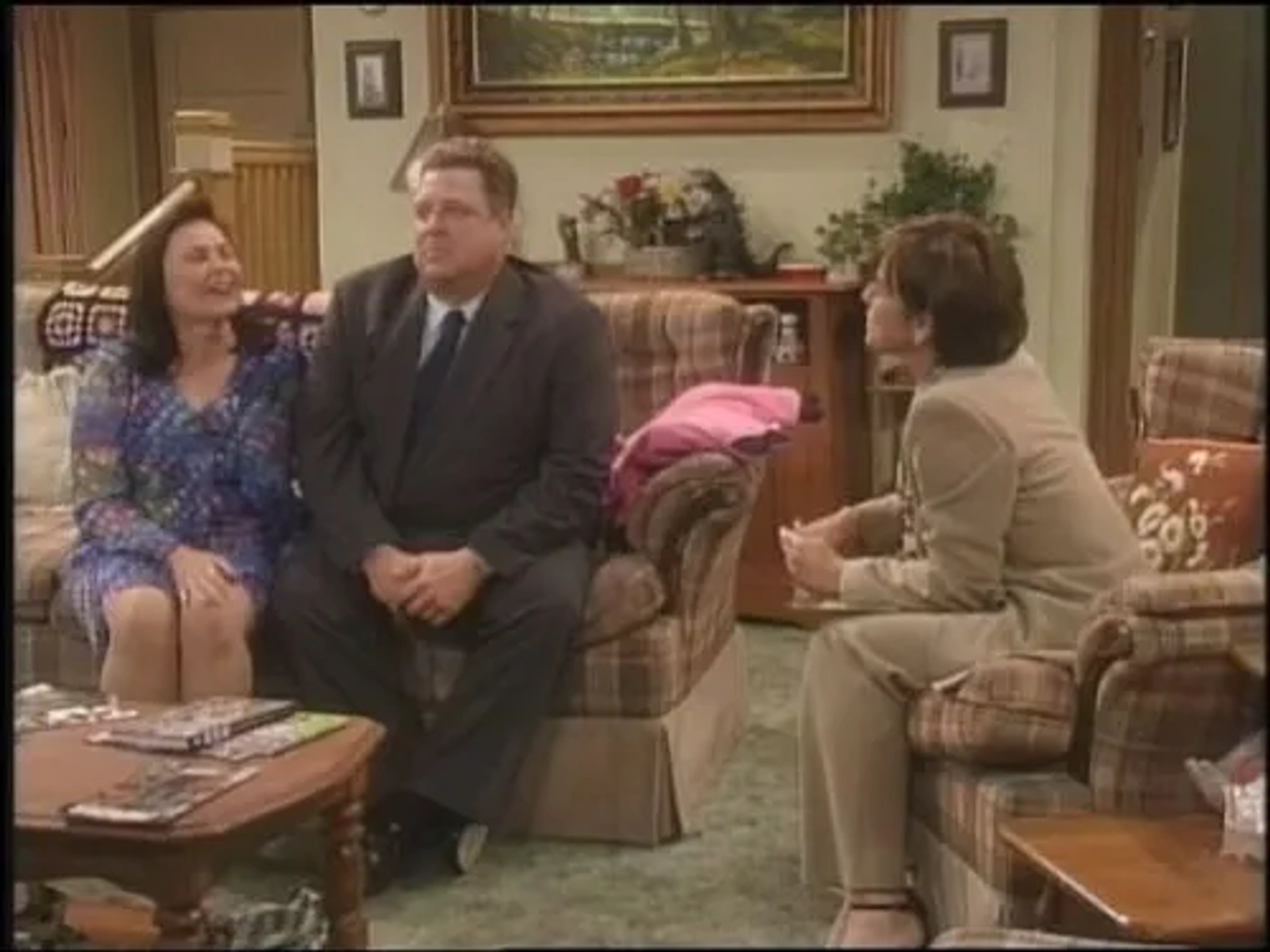 John Goodman, Roseanne Barr, and Kathleen Sullivan in Roseanne (1988)