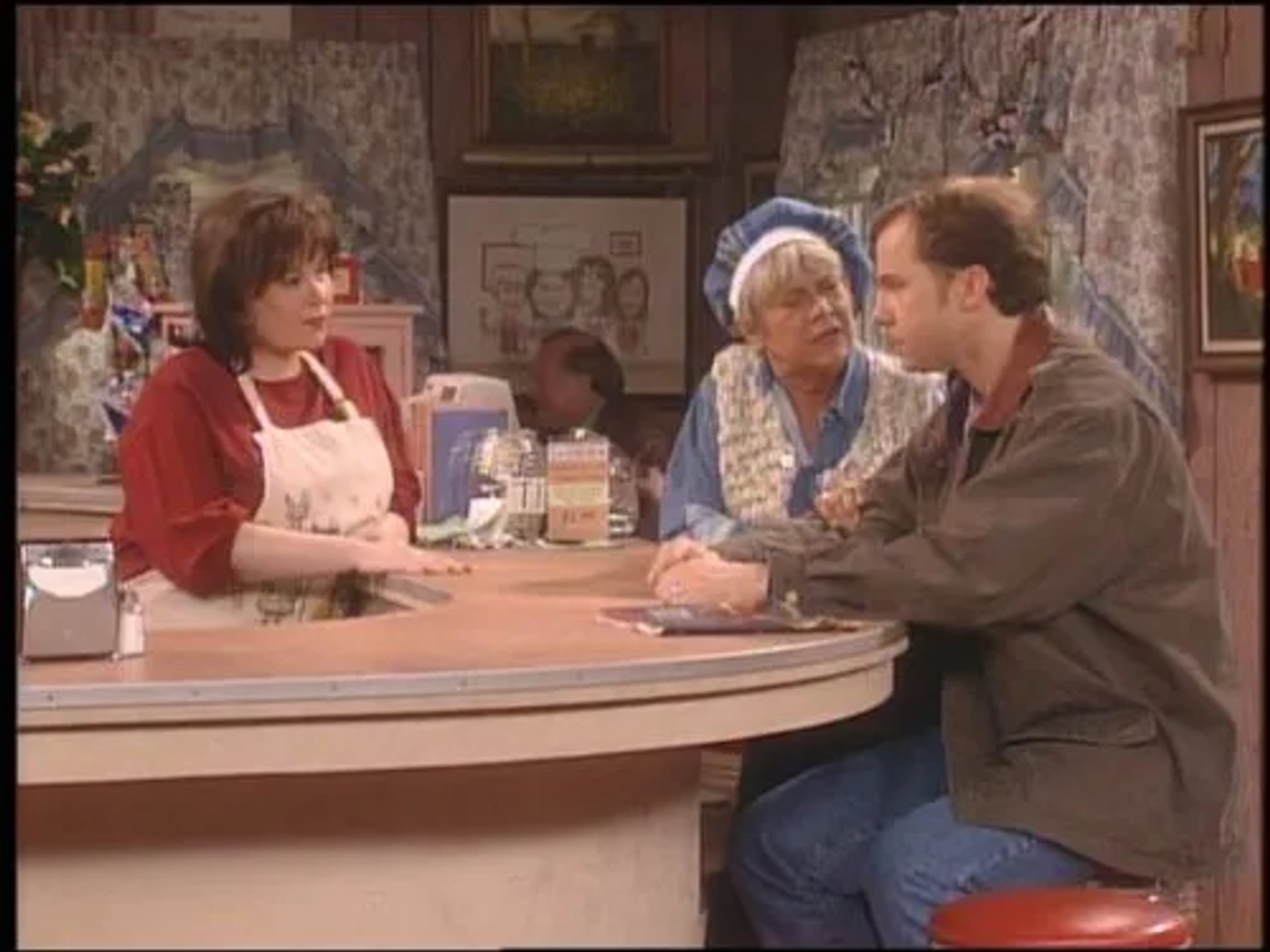 Michael O'Keefe, Roseanne Barr, and Estelle Parsons in Roseanne (1988)