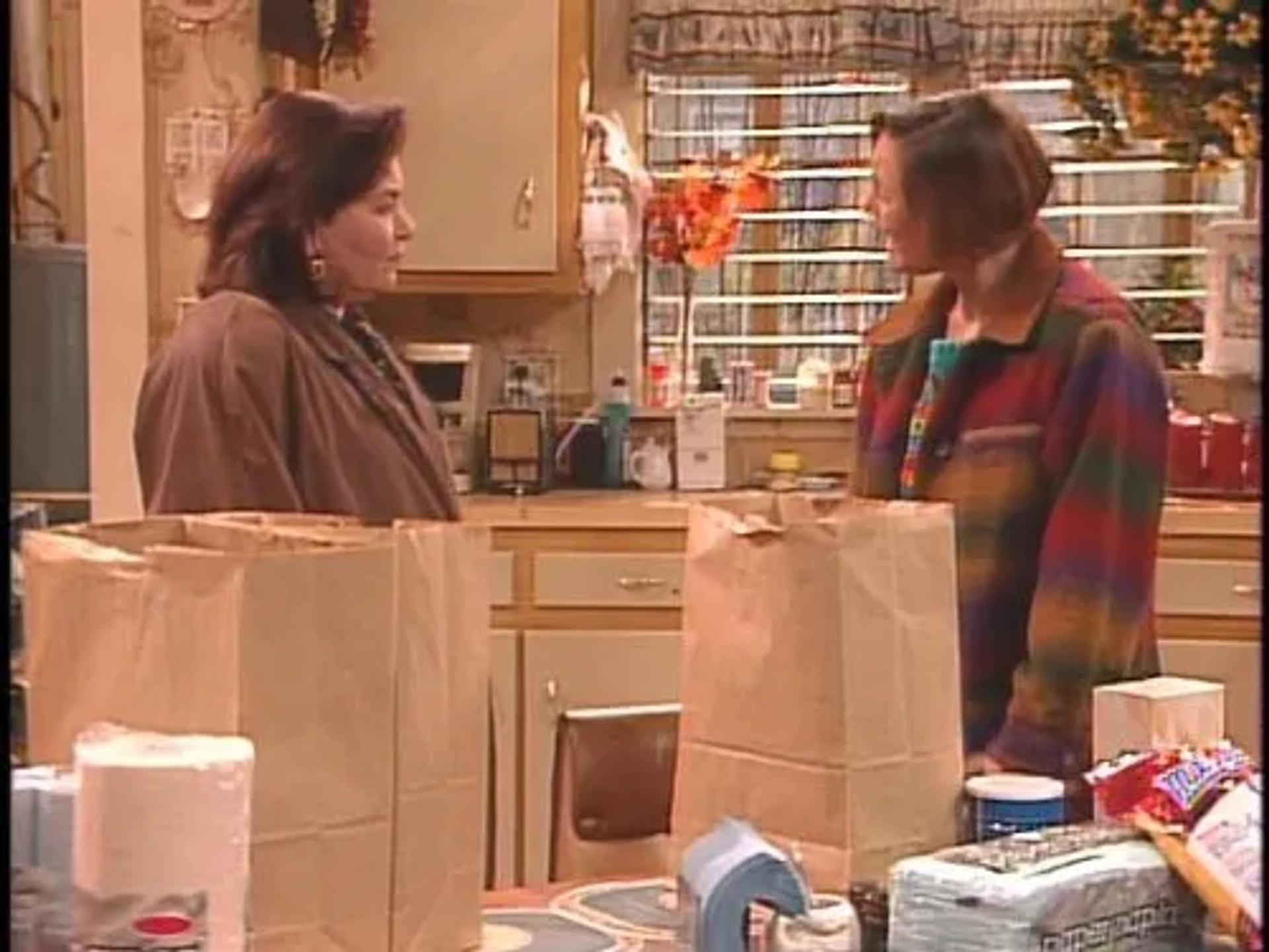 Roseanne Barr and Laurie Metcalf in Roseanne (1988)