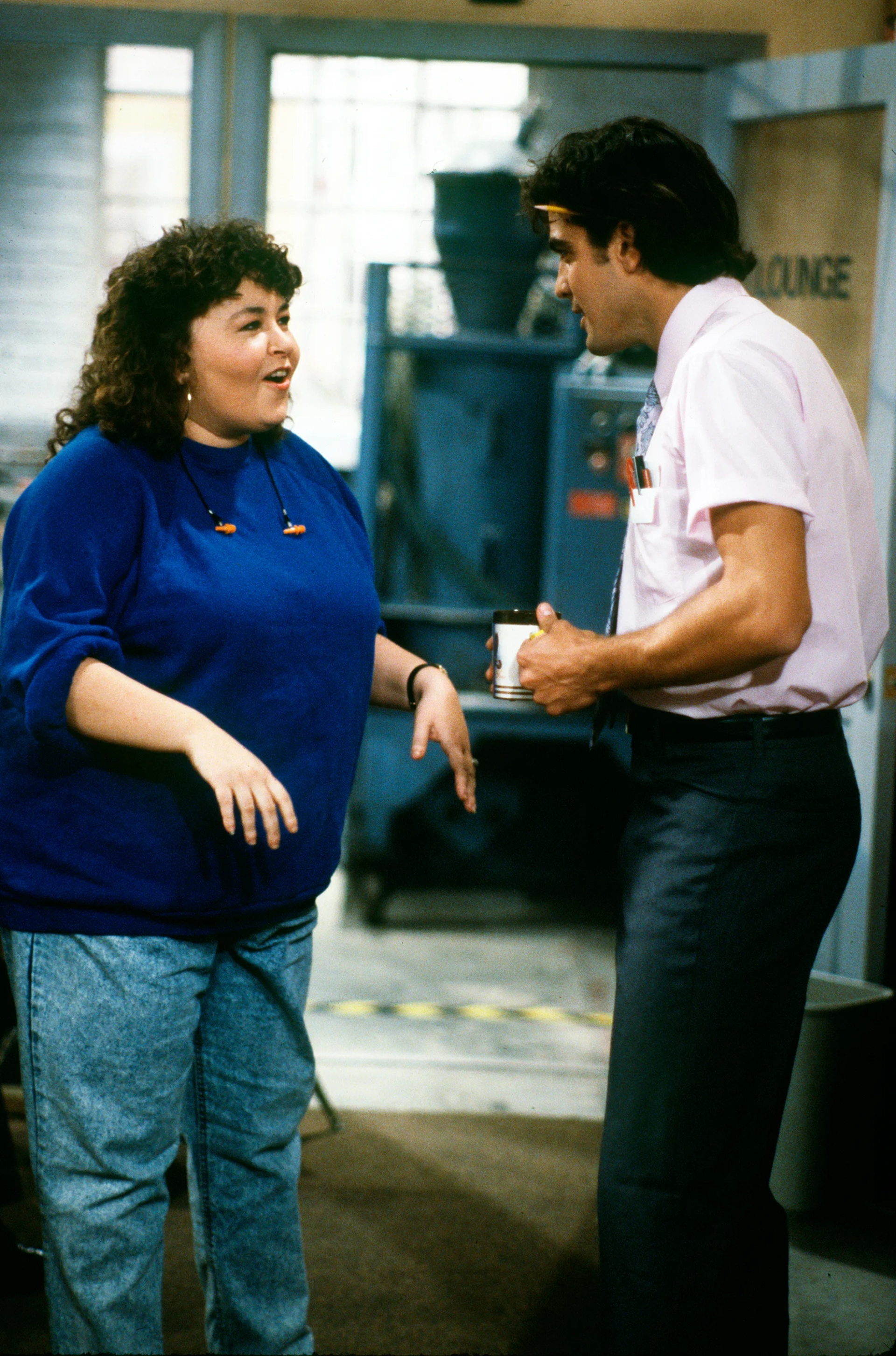 George Clooney and Roseanne Barr in Roseanne (1988)