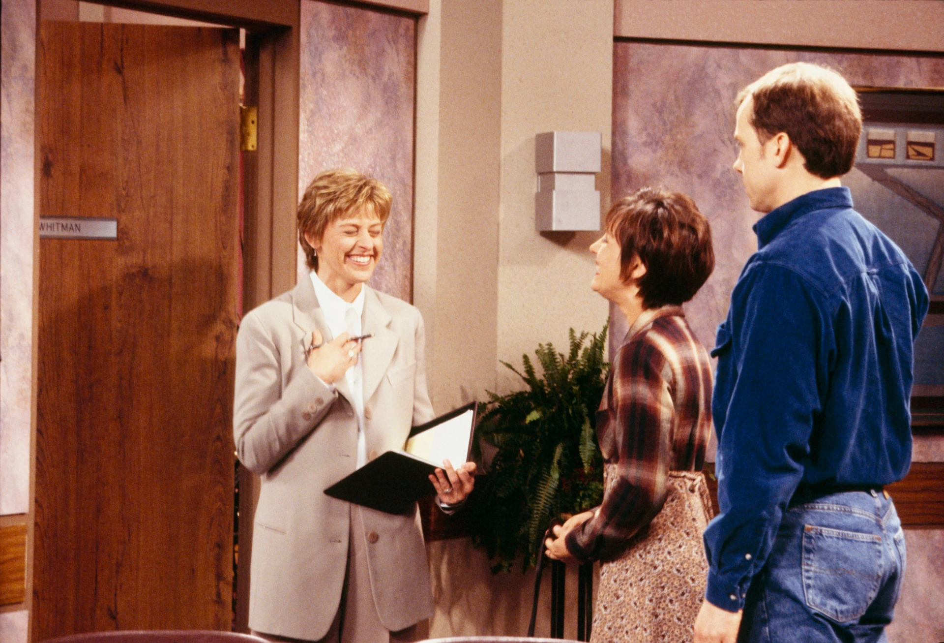 Ellen DeGeneres, Michael O'Keefe, and Laurie Metcalf in Roseanne (1988)