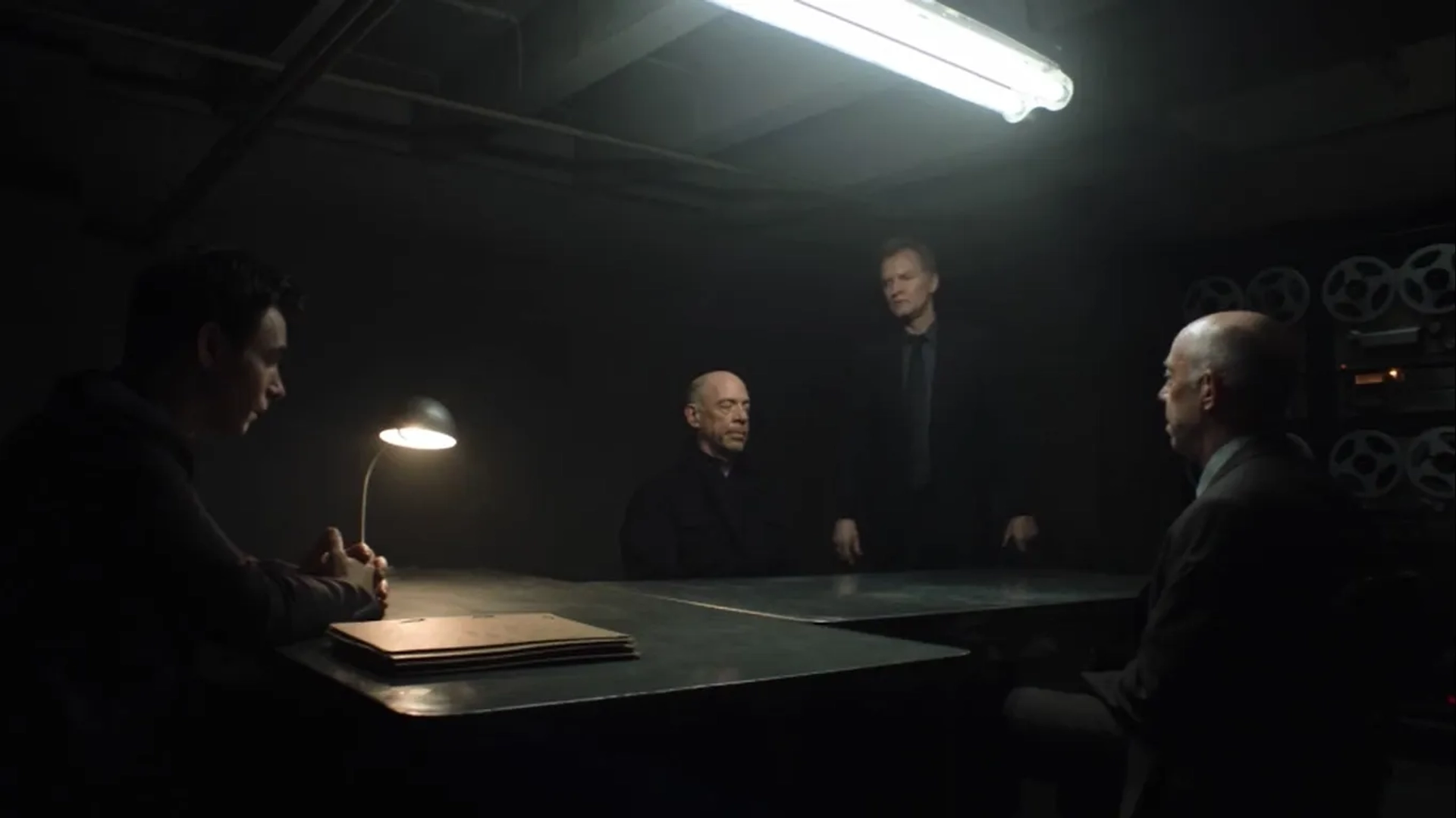 Harry Lloyd and J.K. Simmons in Counterpart (2017)