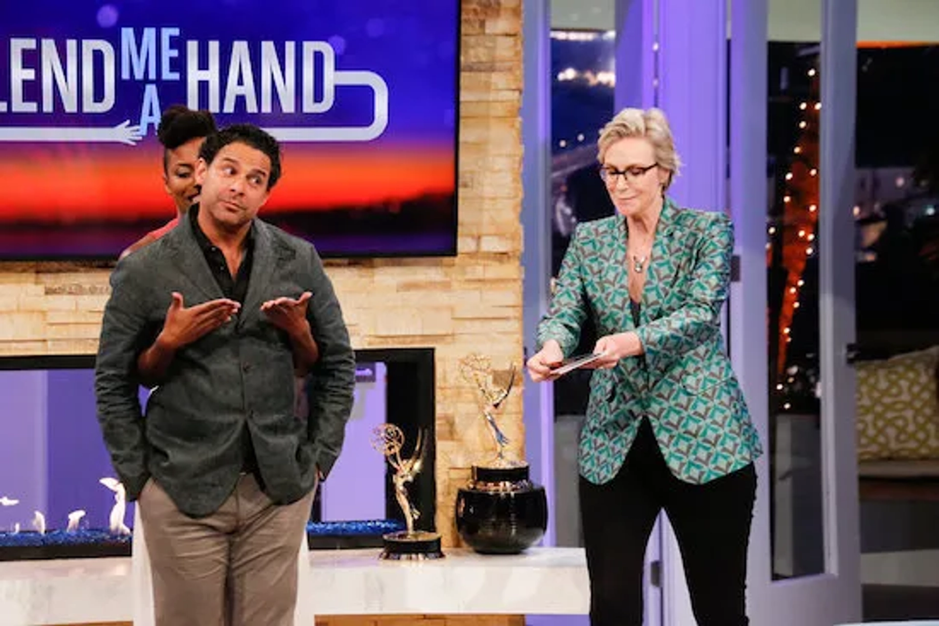 Jon Huertas, Jane Lynch, and Sasheer Zamata in Hollywood Game Night: Chris Is Us (2020)