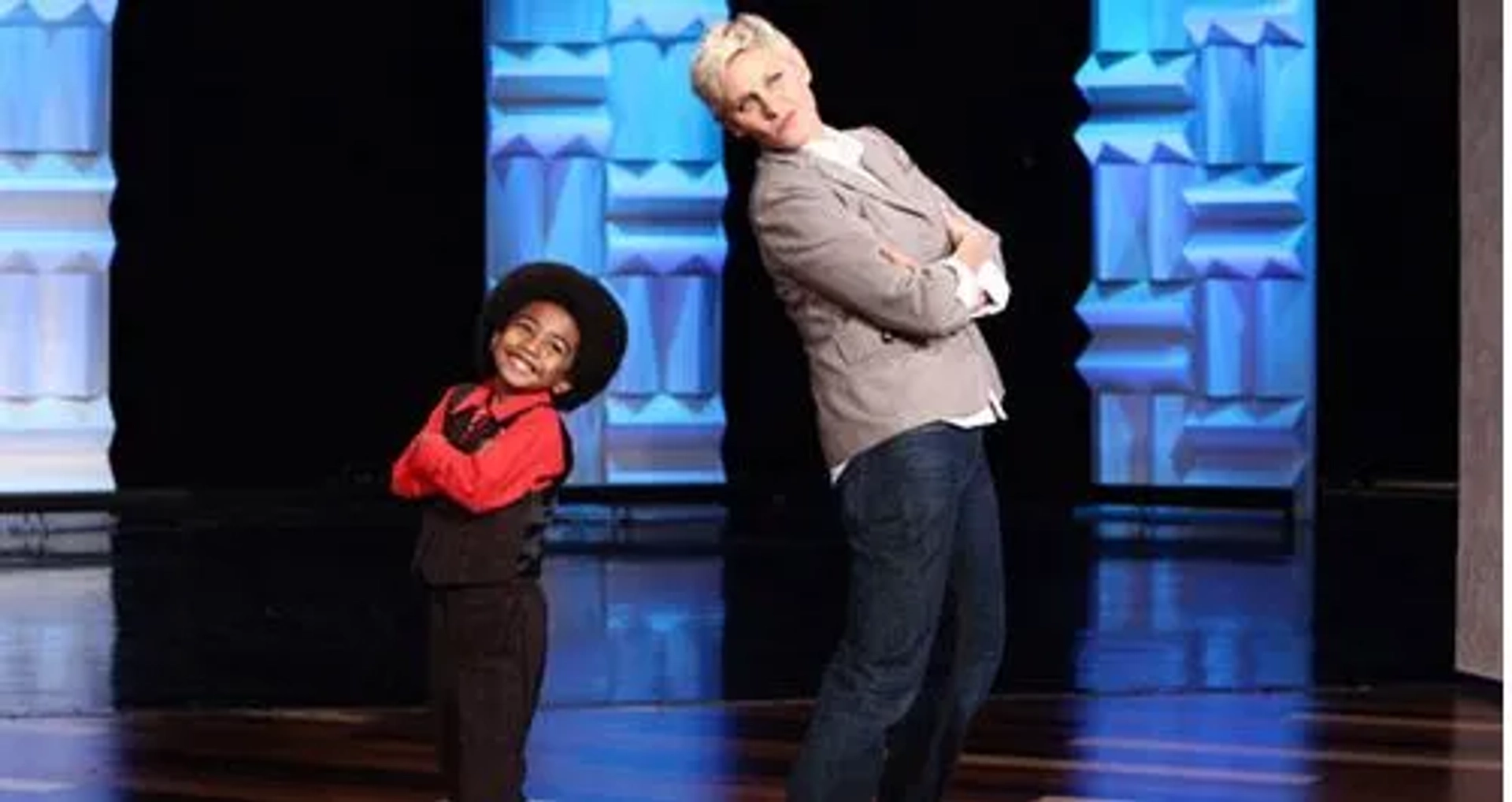 Miles Brown dances & poses with Ellen DeGeneres.