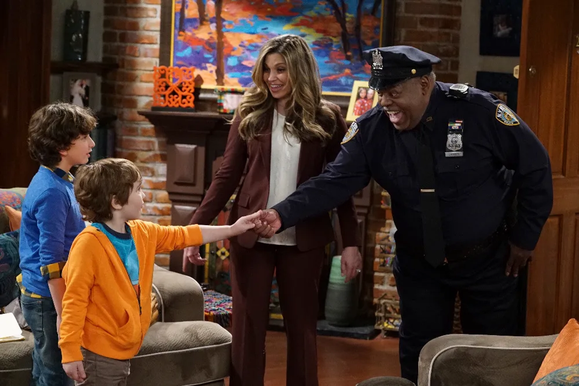 Reginald VelJohnson, Danielle Fishel, August Maturo, and Cooper J. Friedman in Girl Meets World (2014)