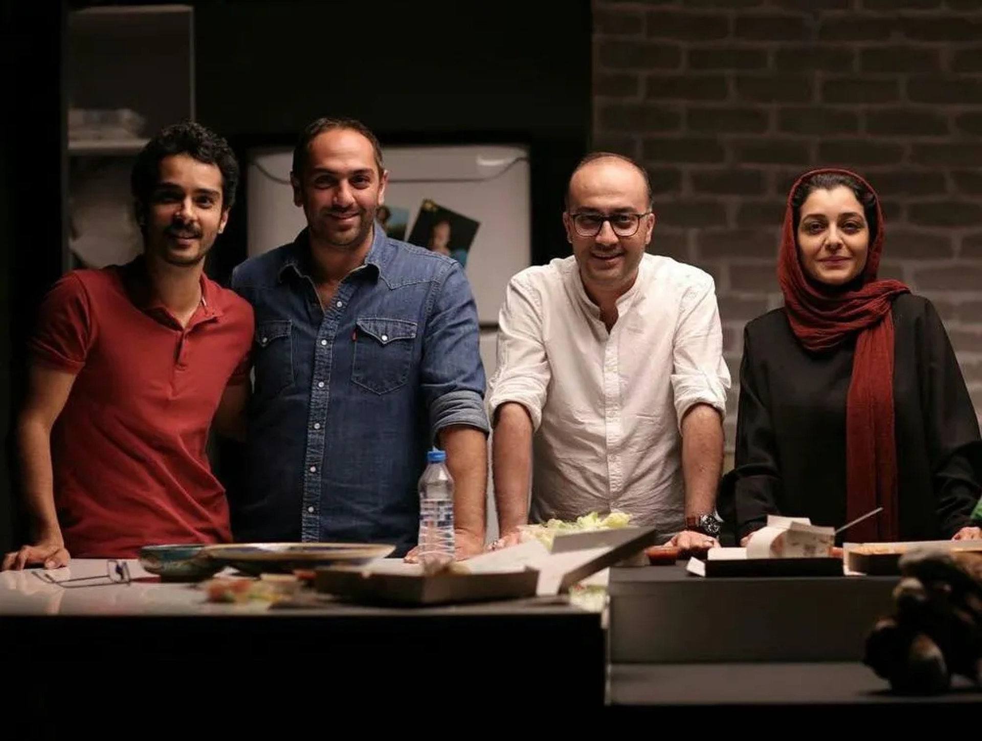 Rouhollah Hejazi, Sareh Bayat, and Saed Soheili in The Dark Room (2018)