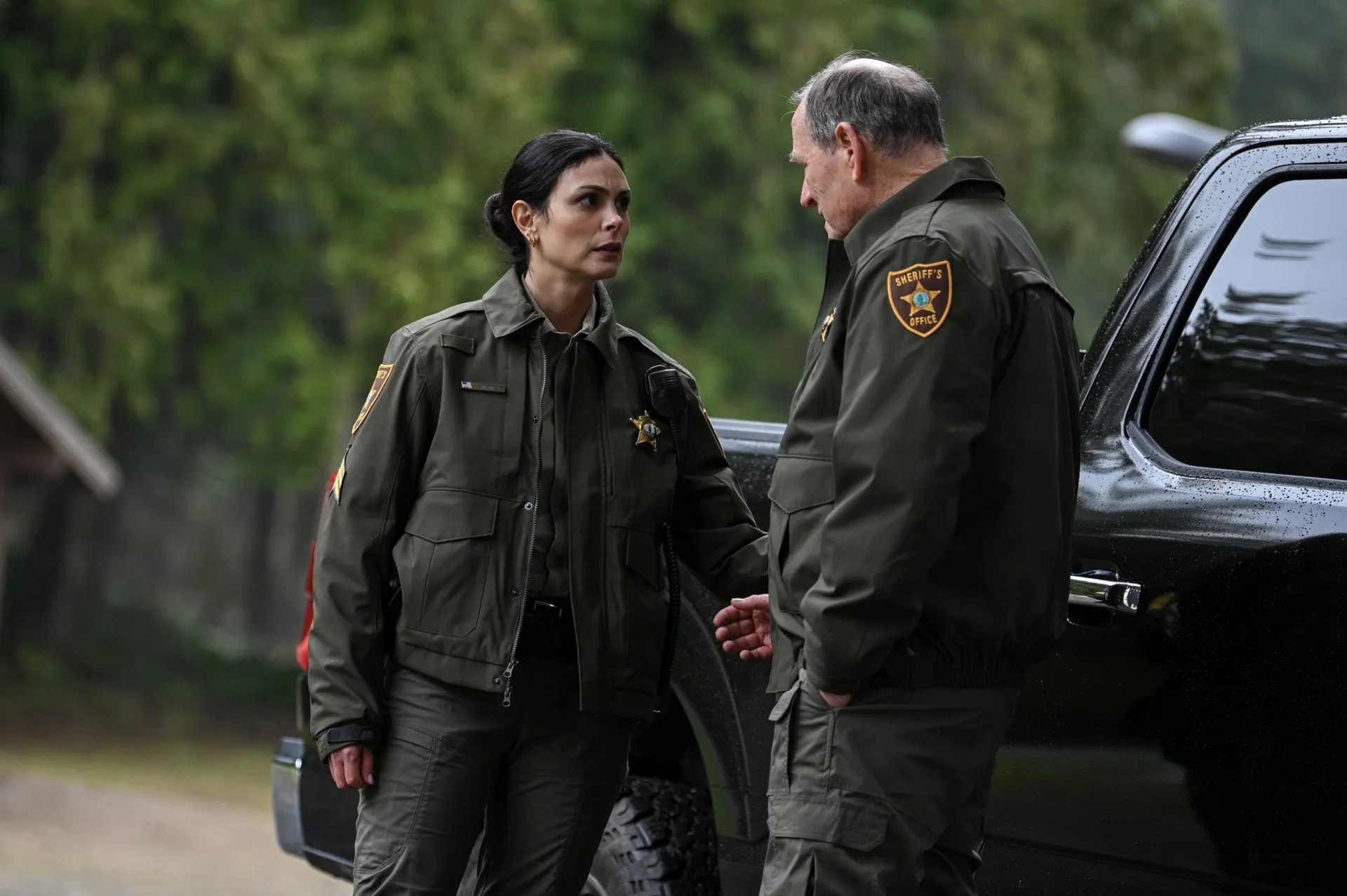 Michael St. John Smith and Morena Baccarin in Fire Country (2022)