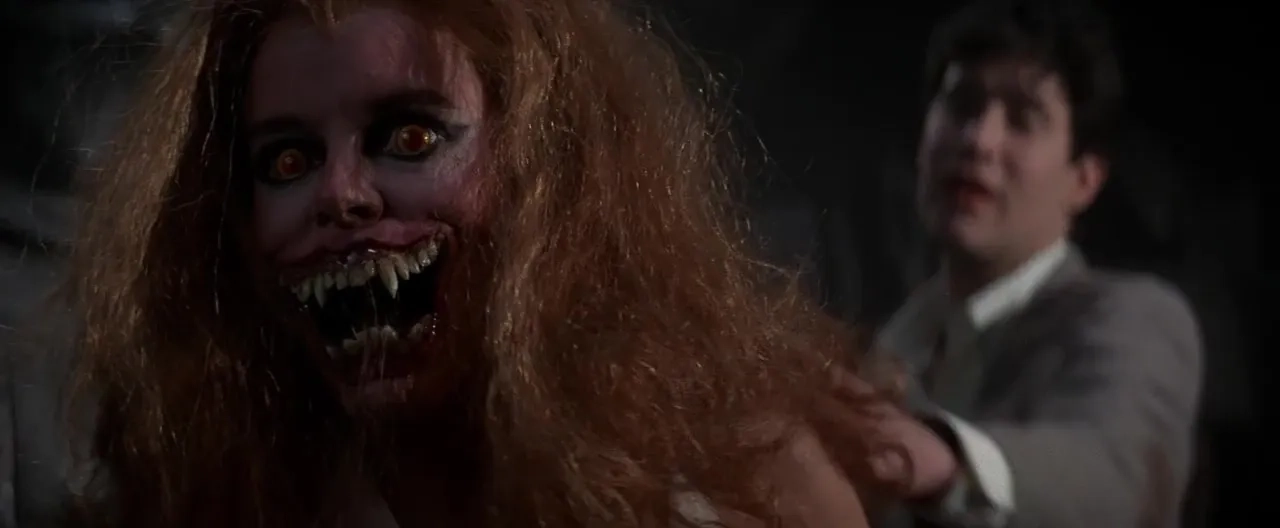 Amanda Bearse and William Ragsdale in Fright Night (1985)