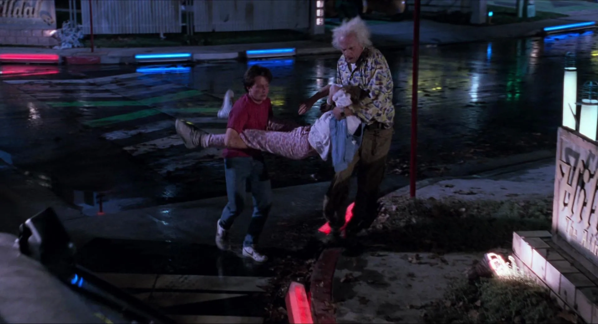 Michael J. Fox, Elisabeth Shue, and Christopher Lloyd in Back to the Future Part II (1989)