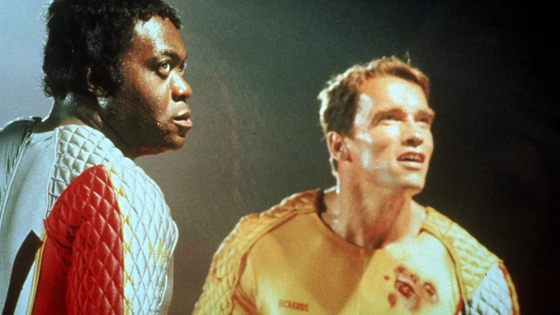 Arnold Schwarzenegger and Yaphet Kotto in The Running Man (1987)