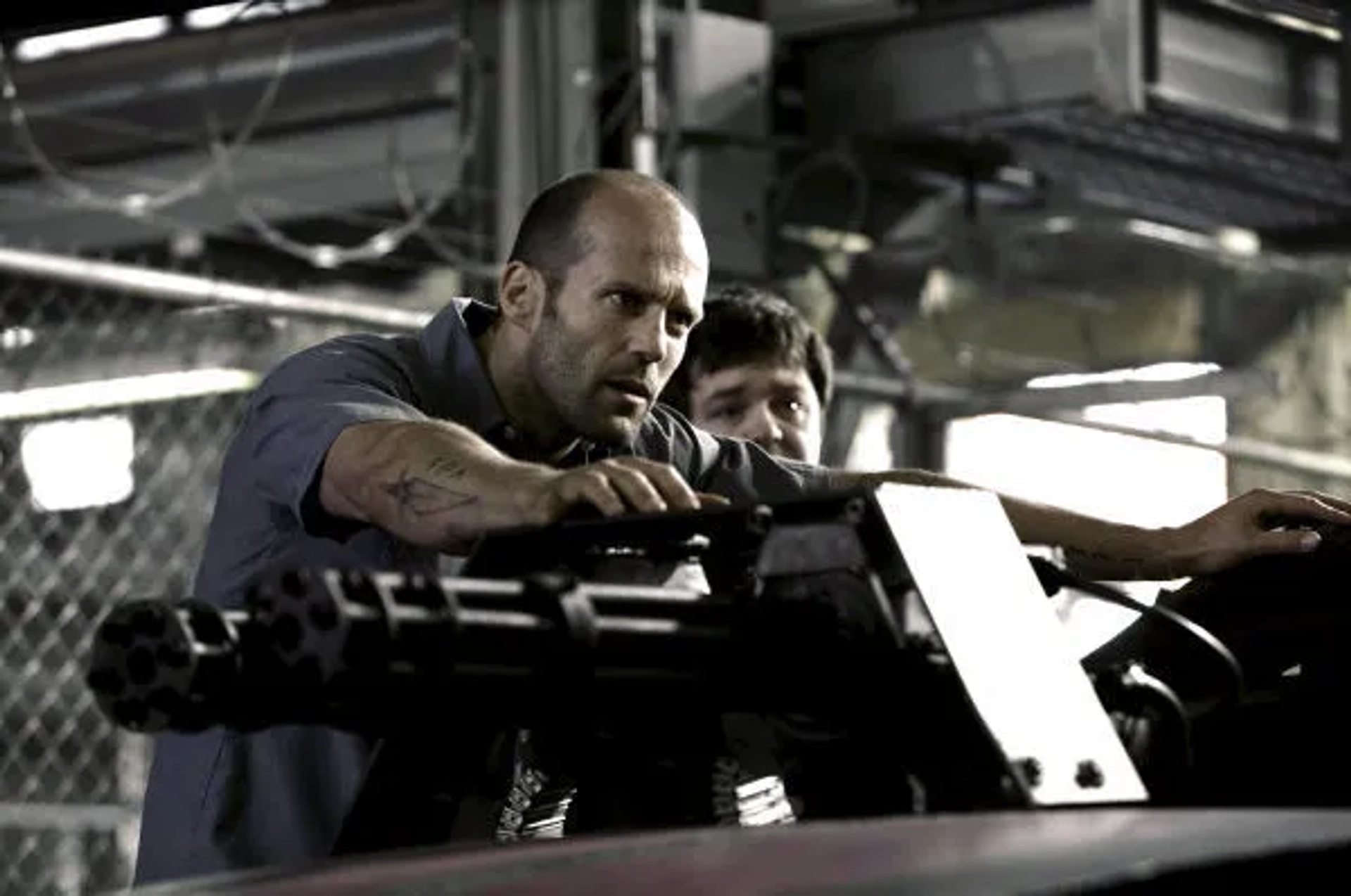 Jason Statham and Frederick Koehler in Death Race (2008)