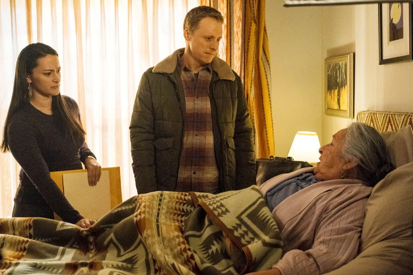 Alan Tudyk, Sara Tomko, and Edna Manitowabi in Resident Alien: Birds of a Feather (2021)