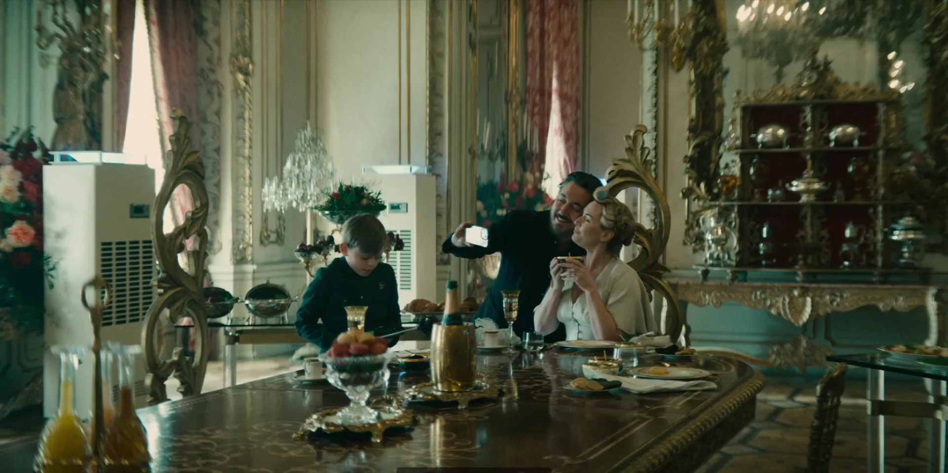 Kate Winslet, Guillaume Gallienne, and Louie Mynett in The Regime (2024)