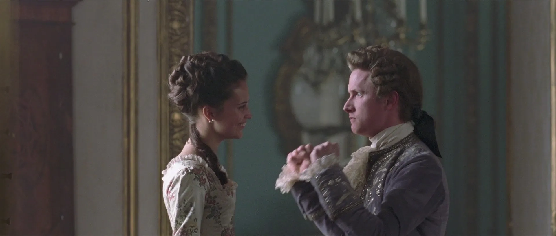 Alicia Vikander and Mikkel Boe Følsgaard in A Royal Affair (2012)