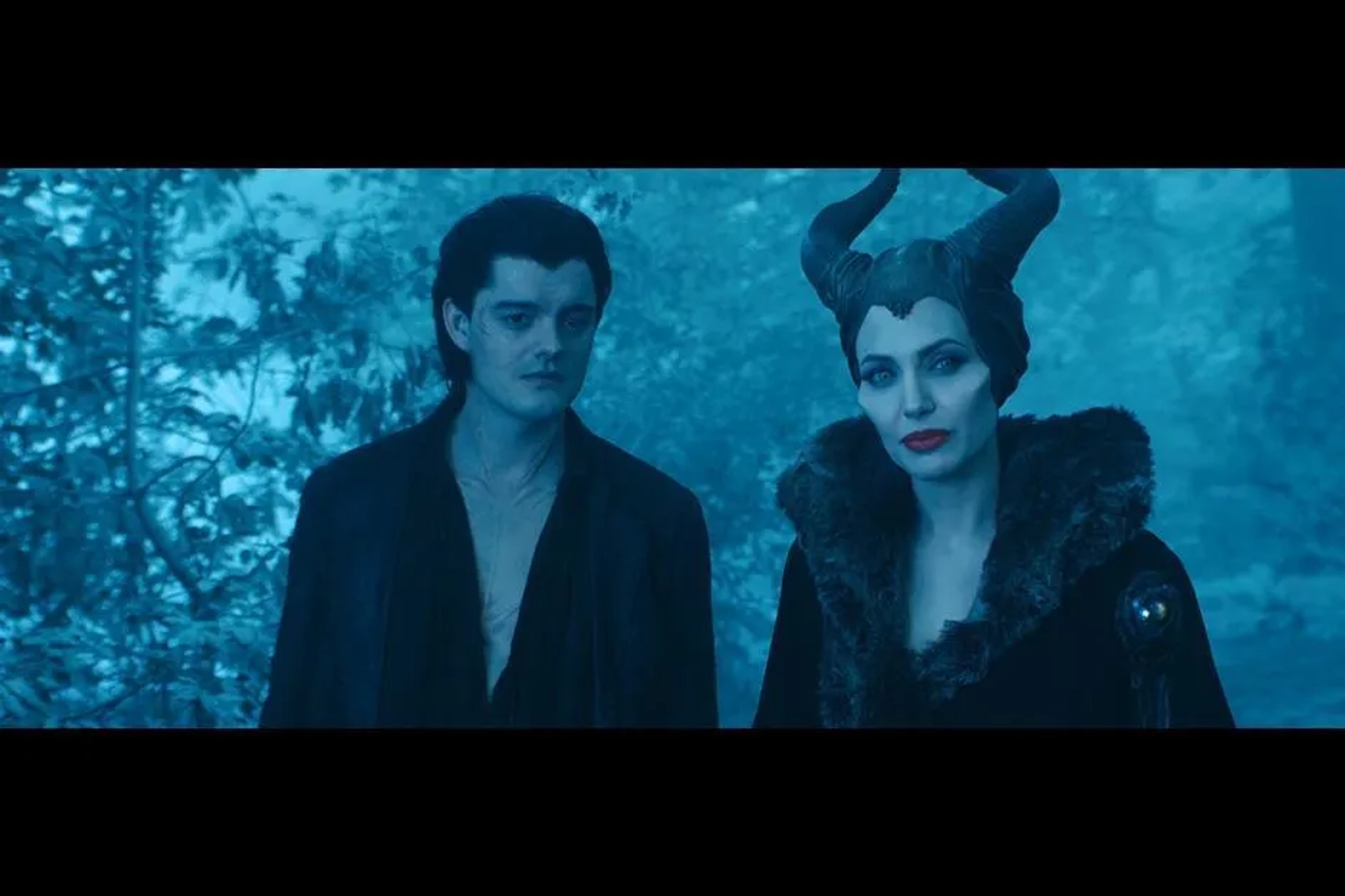 Angelina Jolie and Sam Riley in Maleficent (2014)