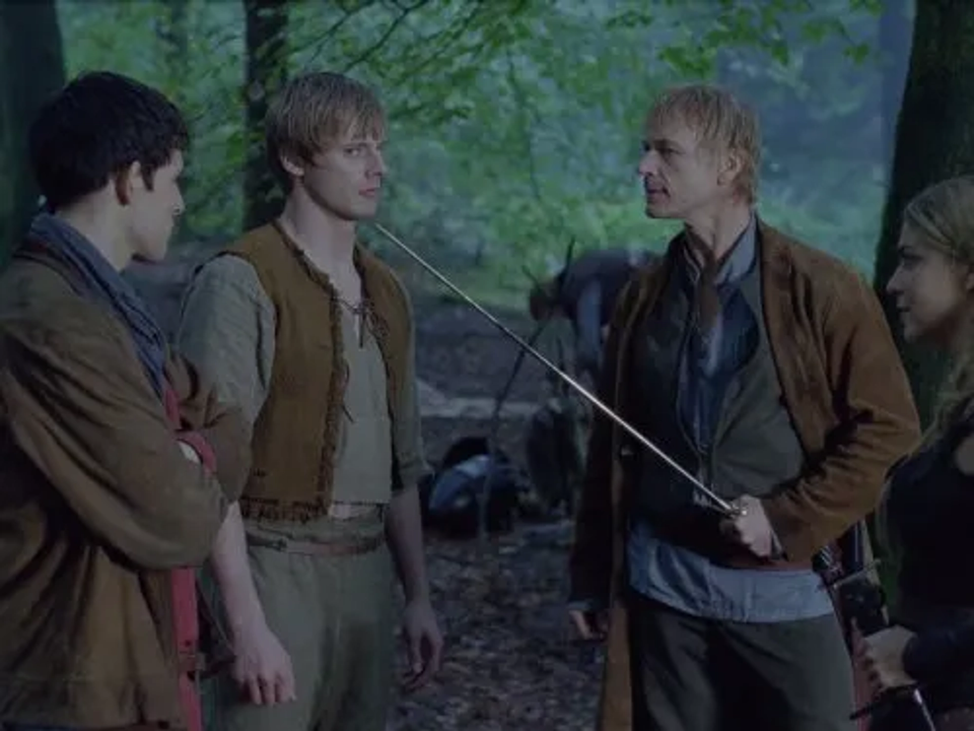 Ben Daniels, Miranda Raison, Colin Morgan, and Bradley James in Merlin (2008)