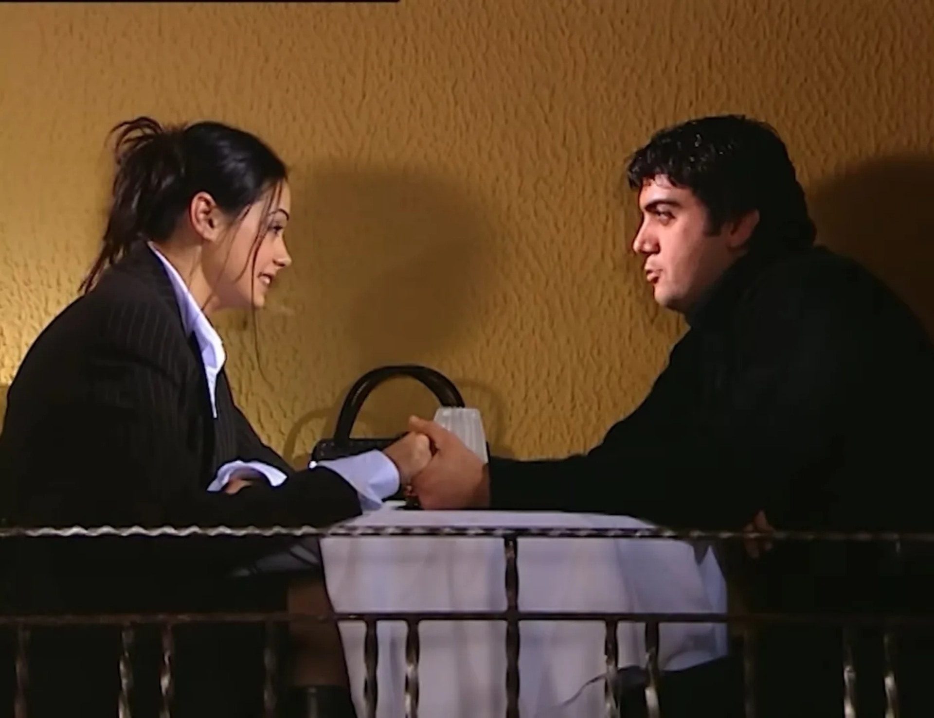 Özgü Namal and Raci Sasmaz in The Valley of the Wolves (2003)