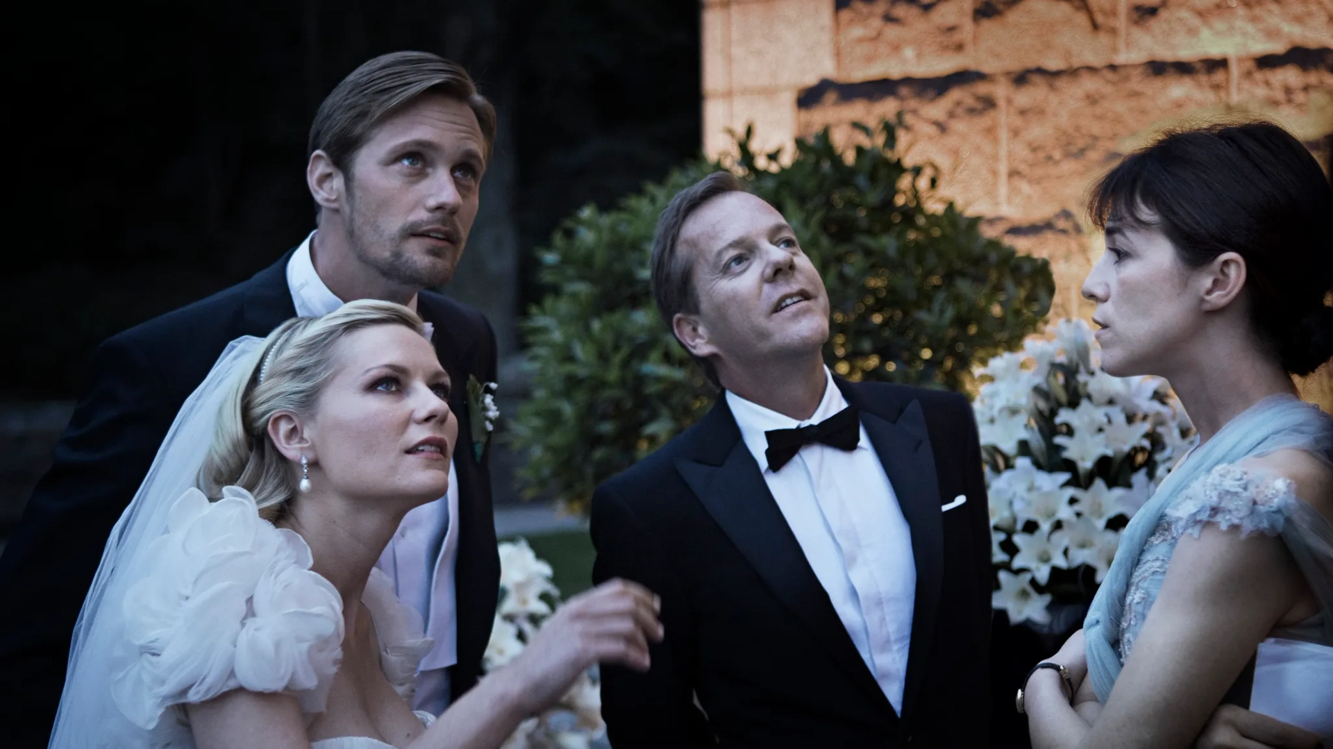 Kirsten Dunst, Kiefer Sutherland, Charlotte Gainsbourg, and Alexander Skarsgård in Melancholia (2011)