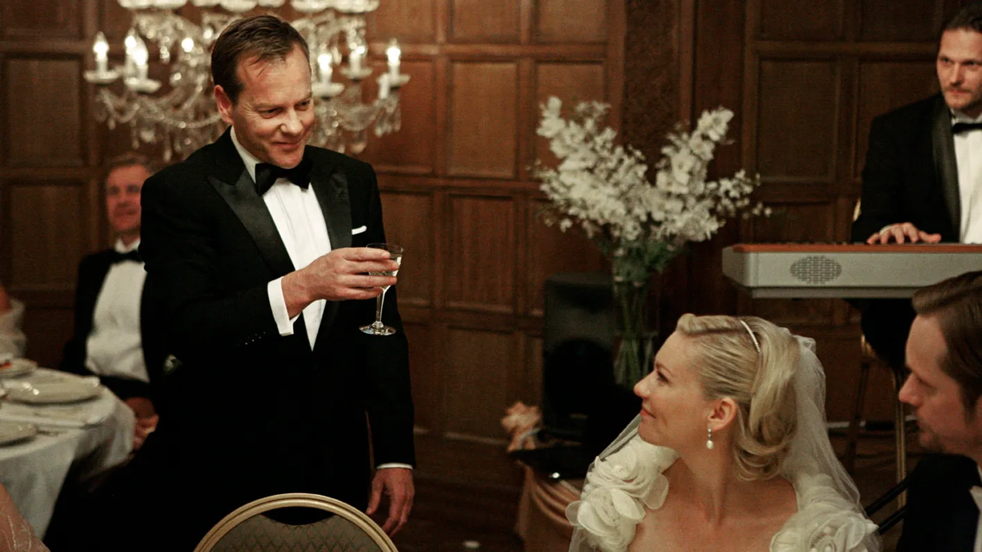 Kirsten Dunst, Kiefer Sutherland, and Alexander Skarsgård in Melancholia (2011)