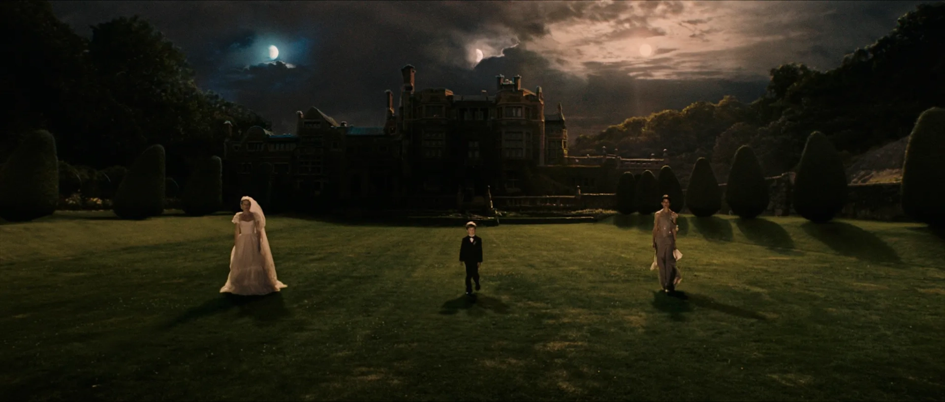 Kirsten Dunst, Charlotte Gainsbourg, and Cameron Spurr in Melancholia (2011)