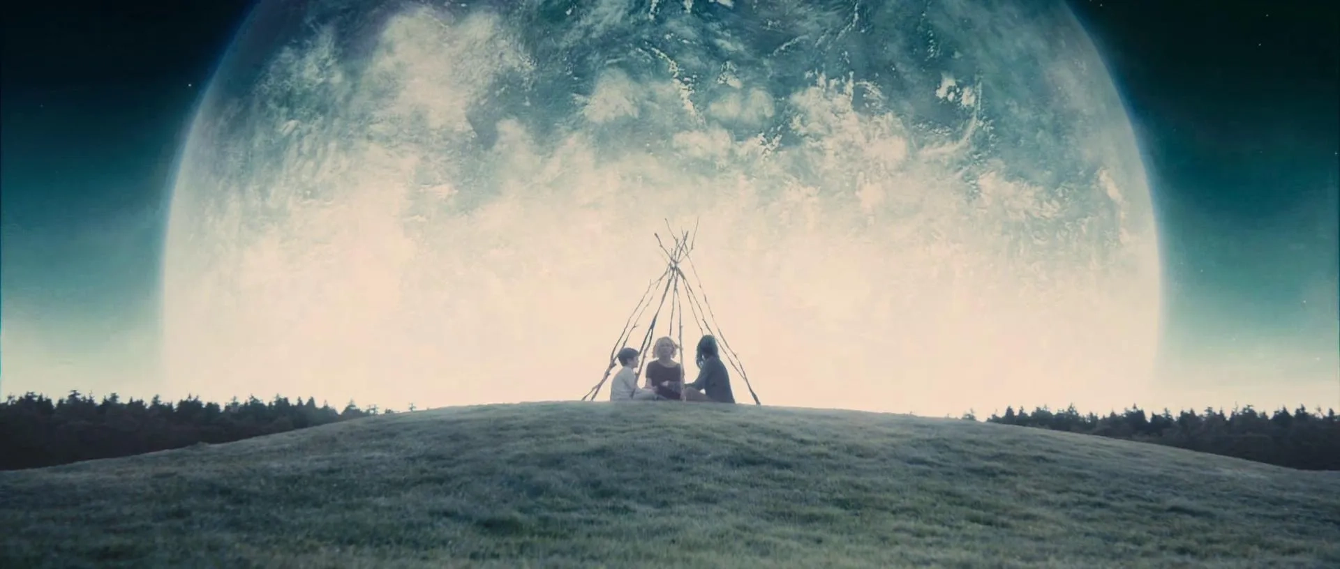 Kirsten Dunst, Charlotte Gainsbourg, and Cameron Spurr in Melancholia (2011)